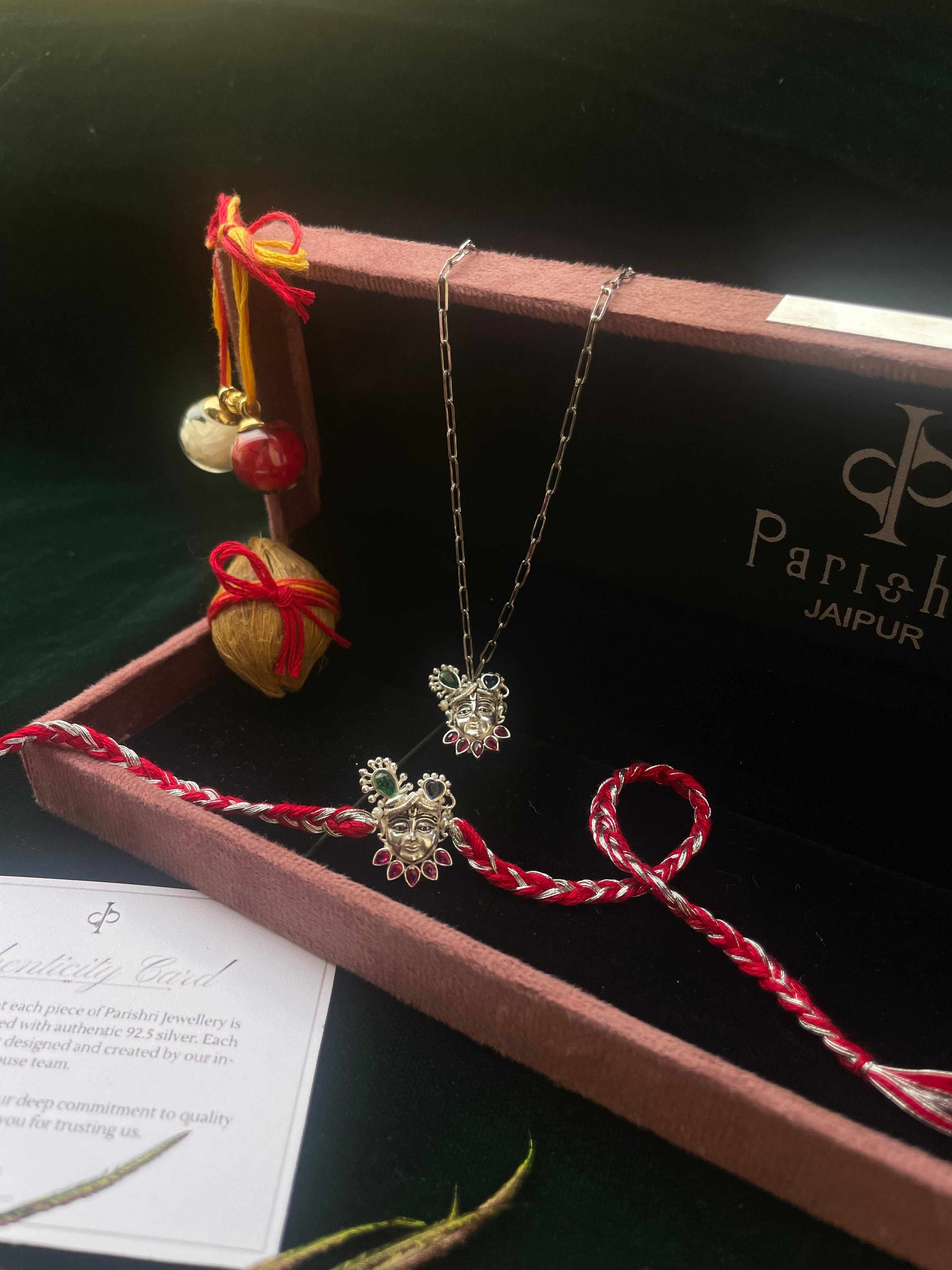 Pair Of Shreenath Swaroop Rakhi And Lumba In Silver
