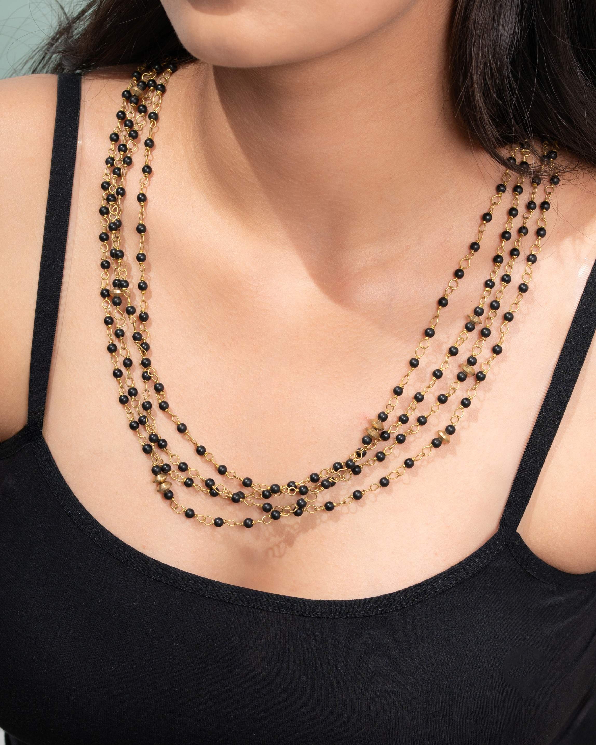 Multi-layered black beaded neclace