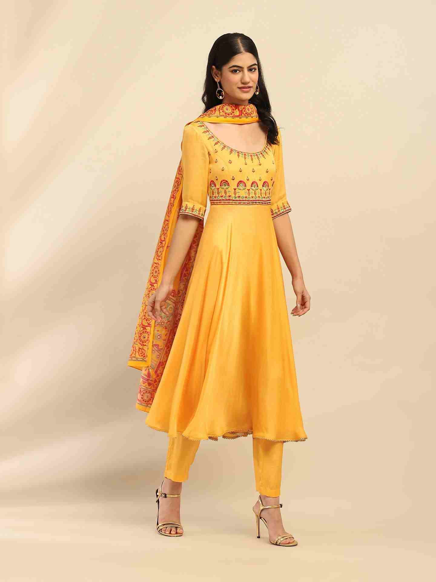 Yellow Tanishqa Solid Anarkali Suit