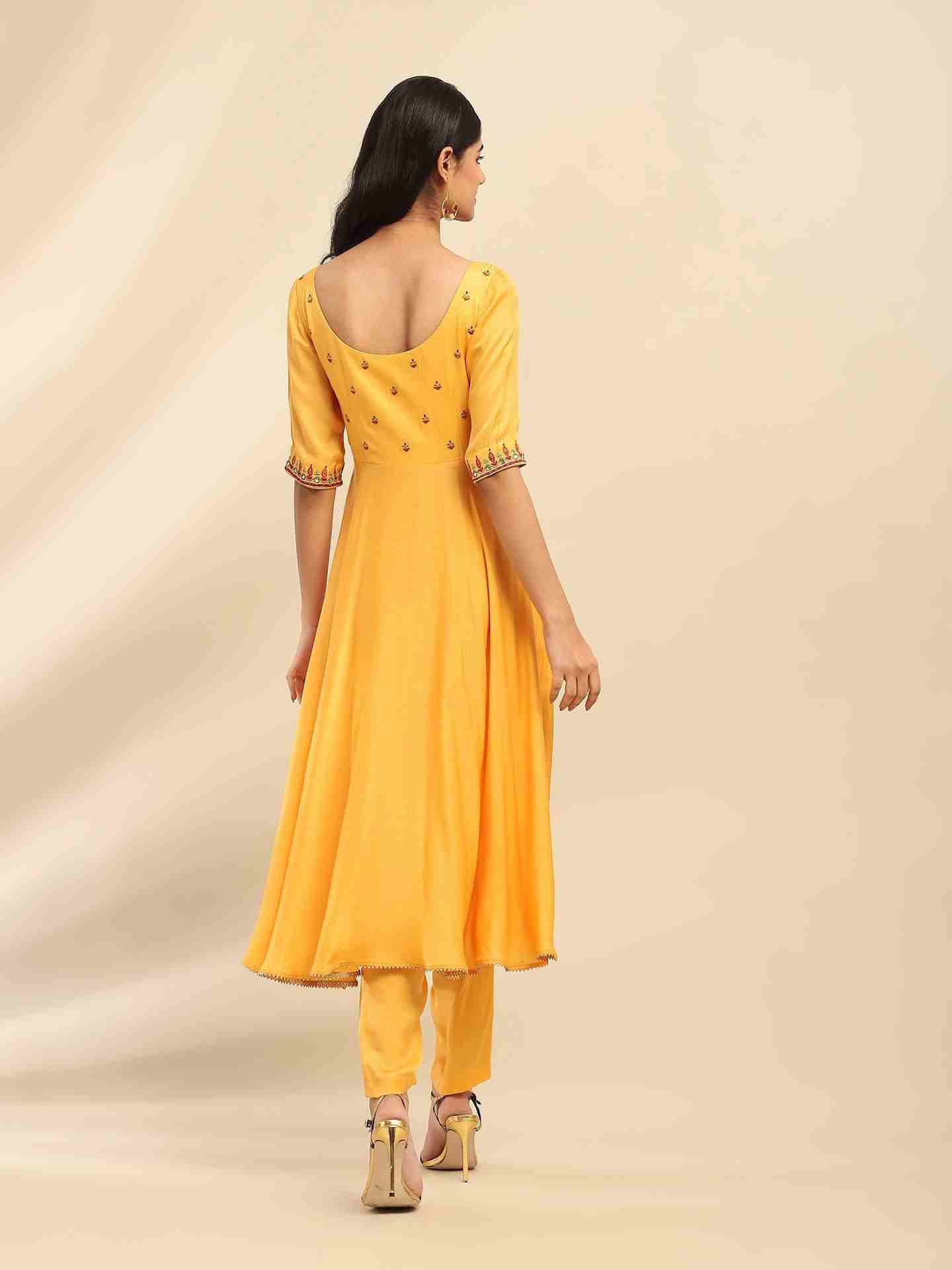 Yellow Tanishqa Solid Anarkali Suit