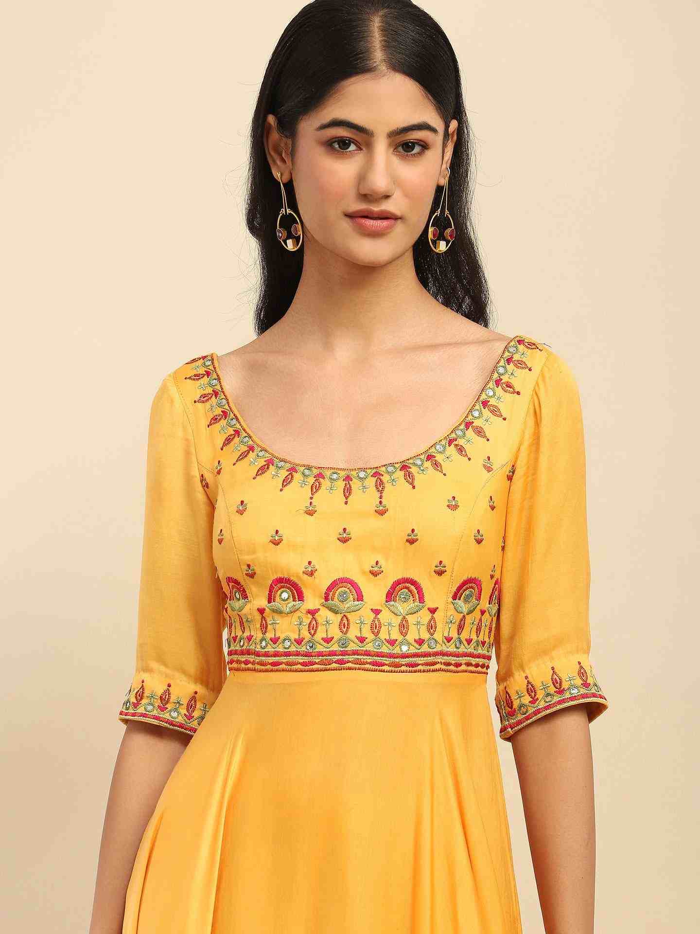Yellow Tanishqa Solid Anarkali Suit