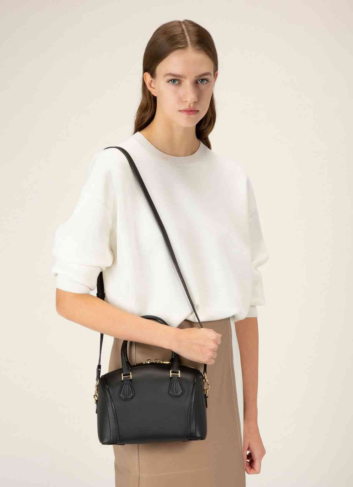 Saffi Small Leather Minibag In Black
