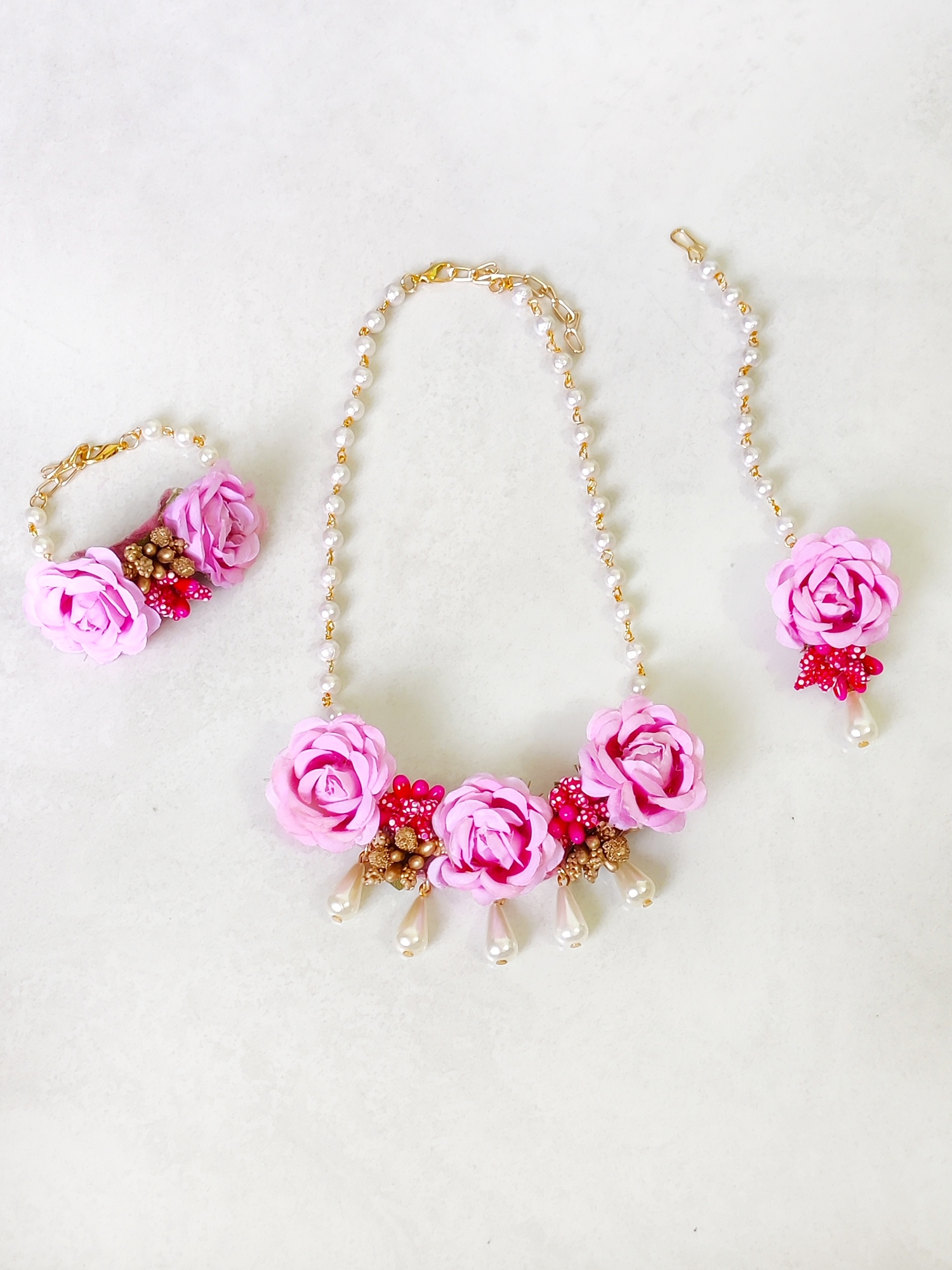 Lime By Manika | Pink Floral Necklace, Bracelet & Maang Teeka Set undefined