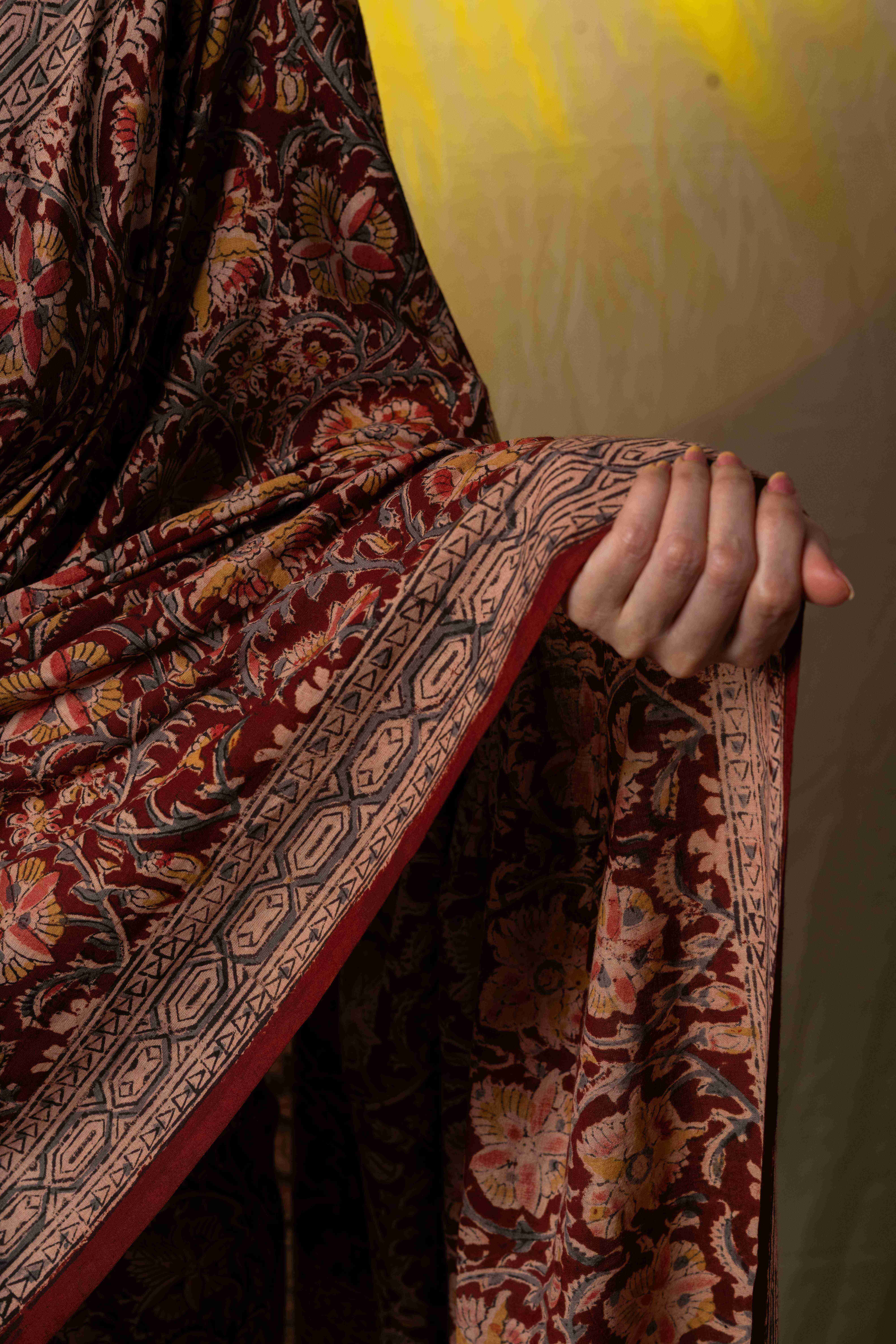 Marron handblock printed kalamkari cotton saree.