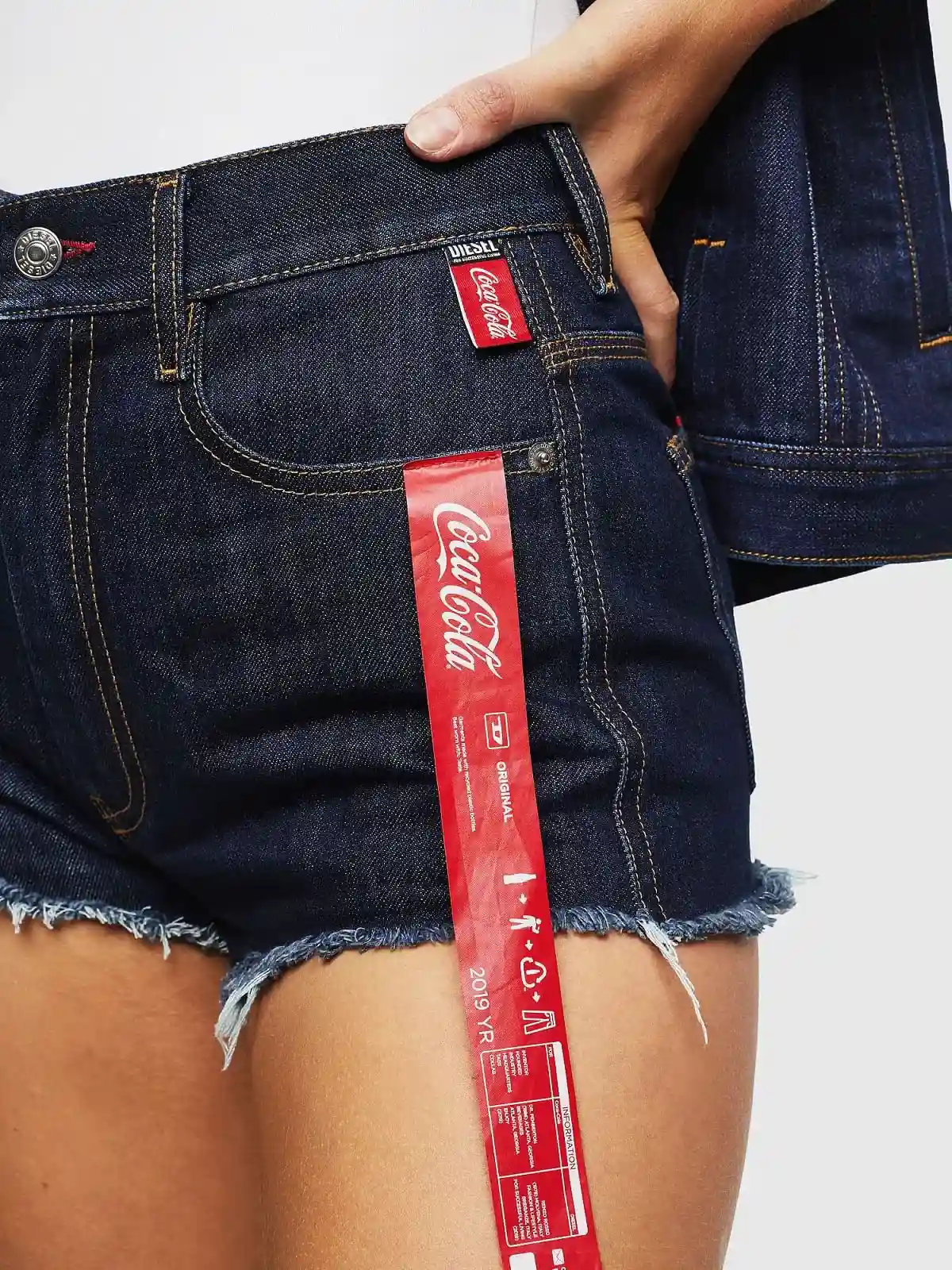 Blue Recycled denim shorts with print and ribbon details