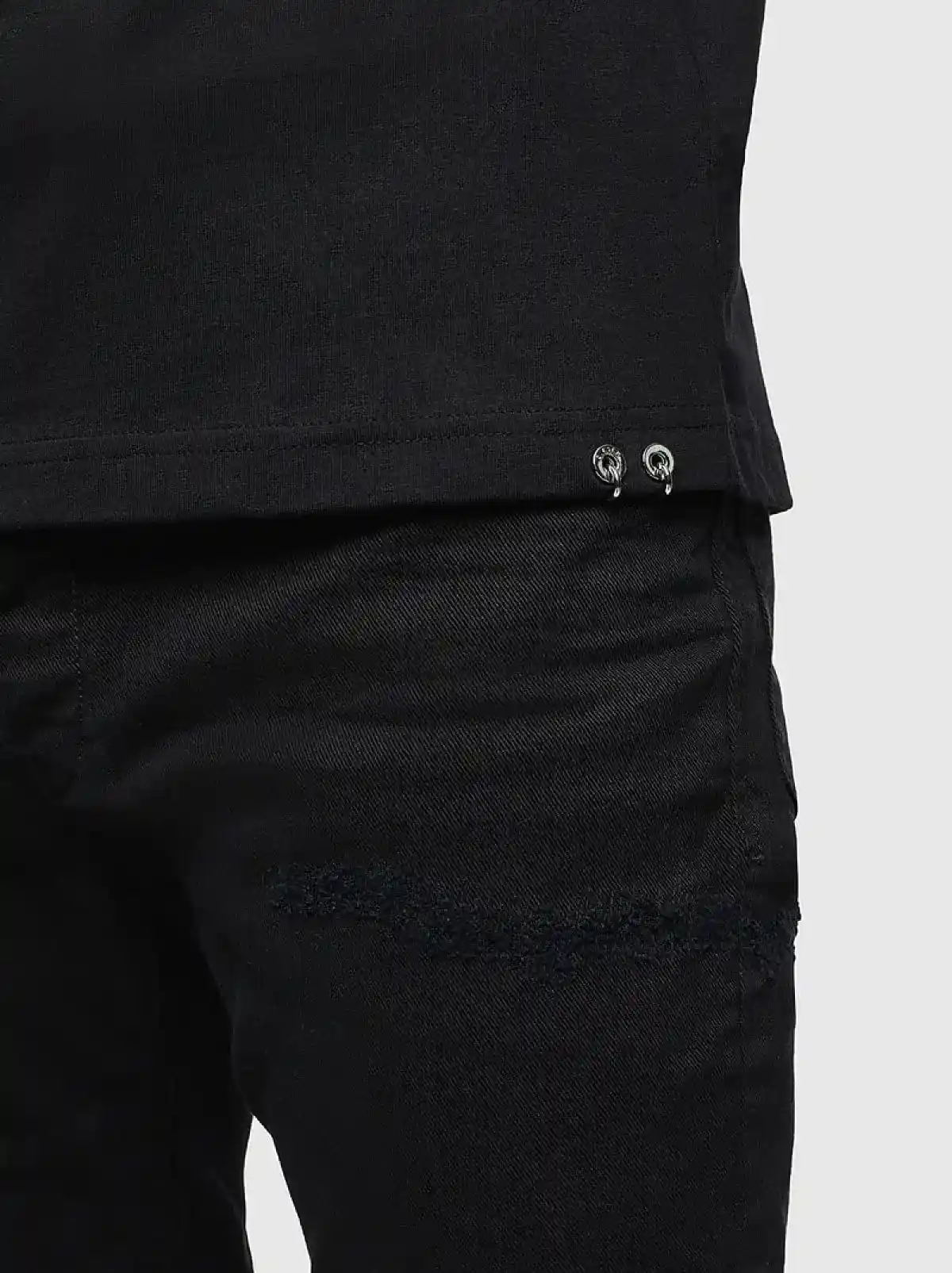 Black T-shirt with beaded Noize lettering