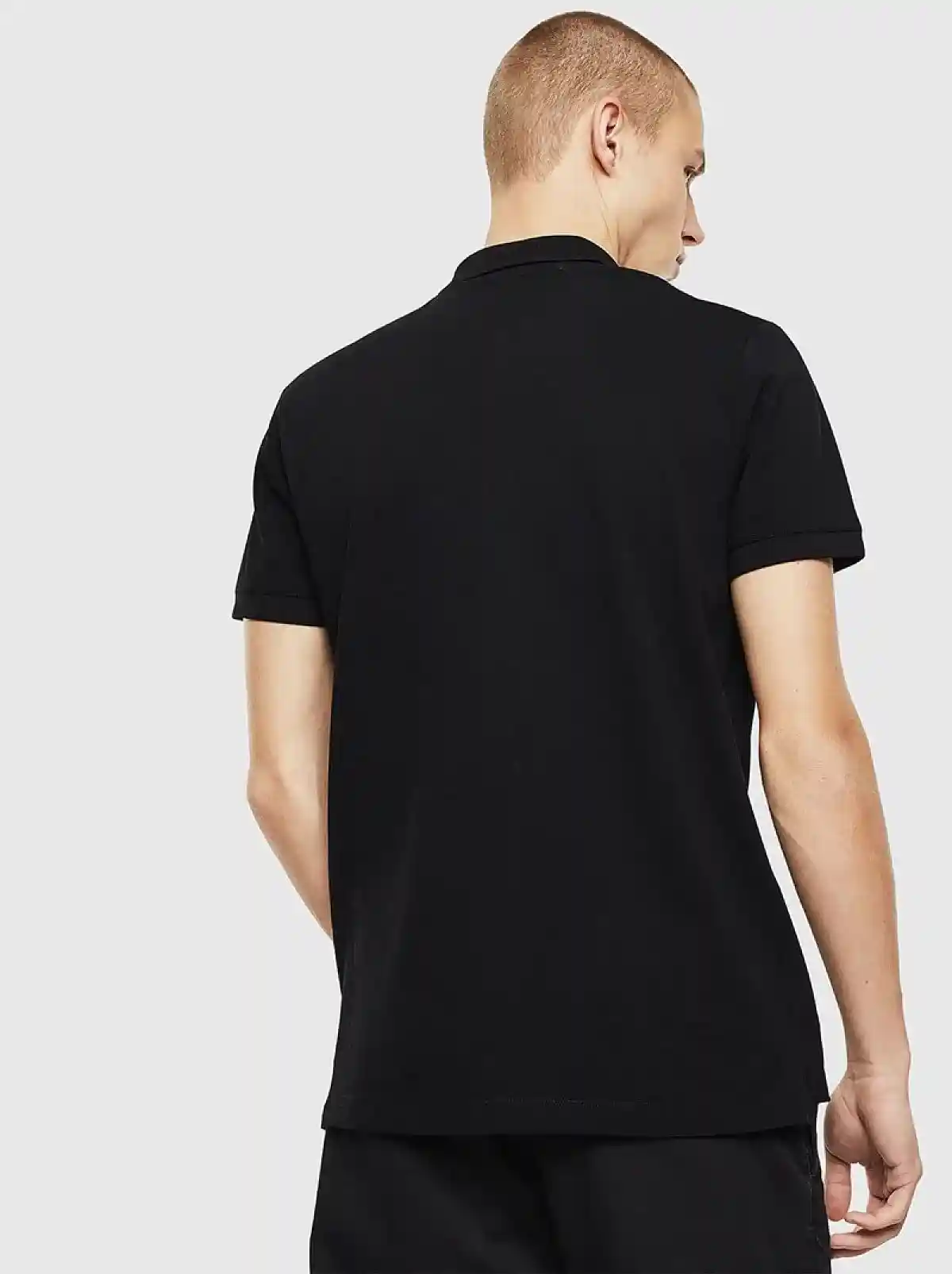 Black Polo shirt with jacquard logo patch