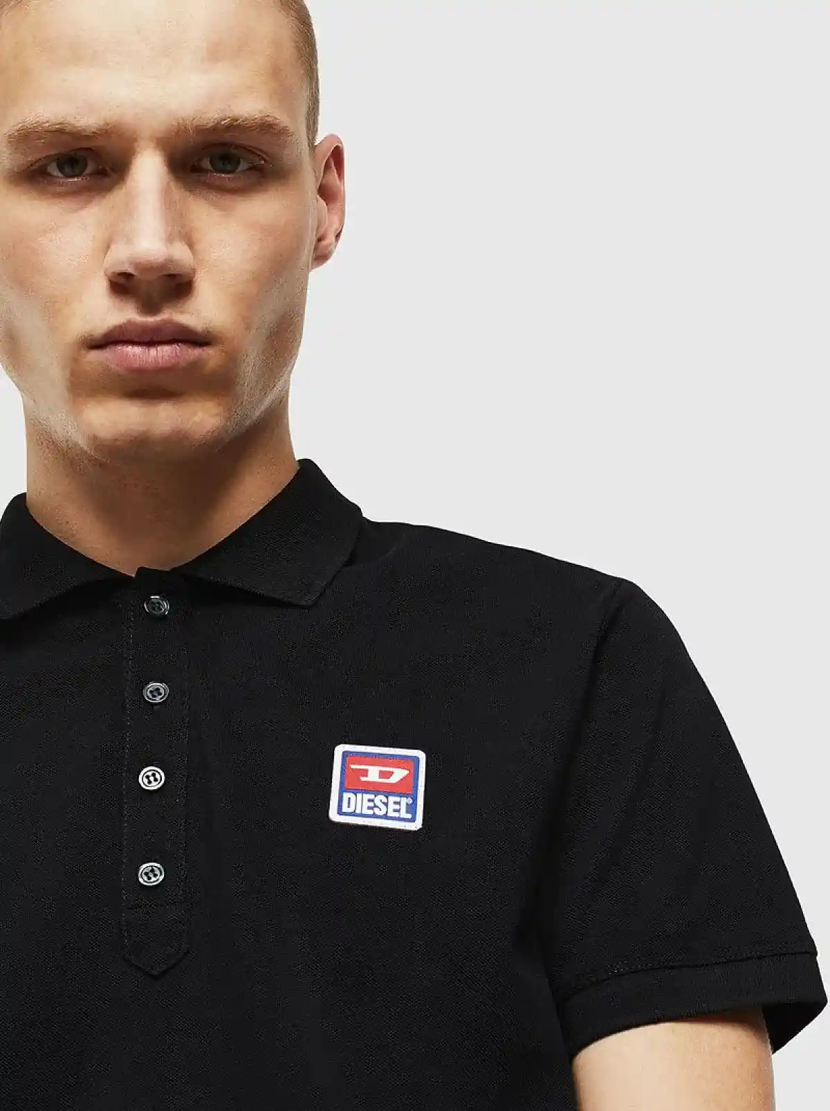 Black Polo shirt with jacquard logo patch