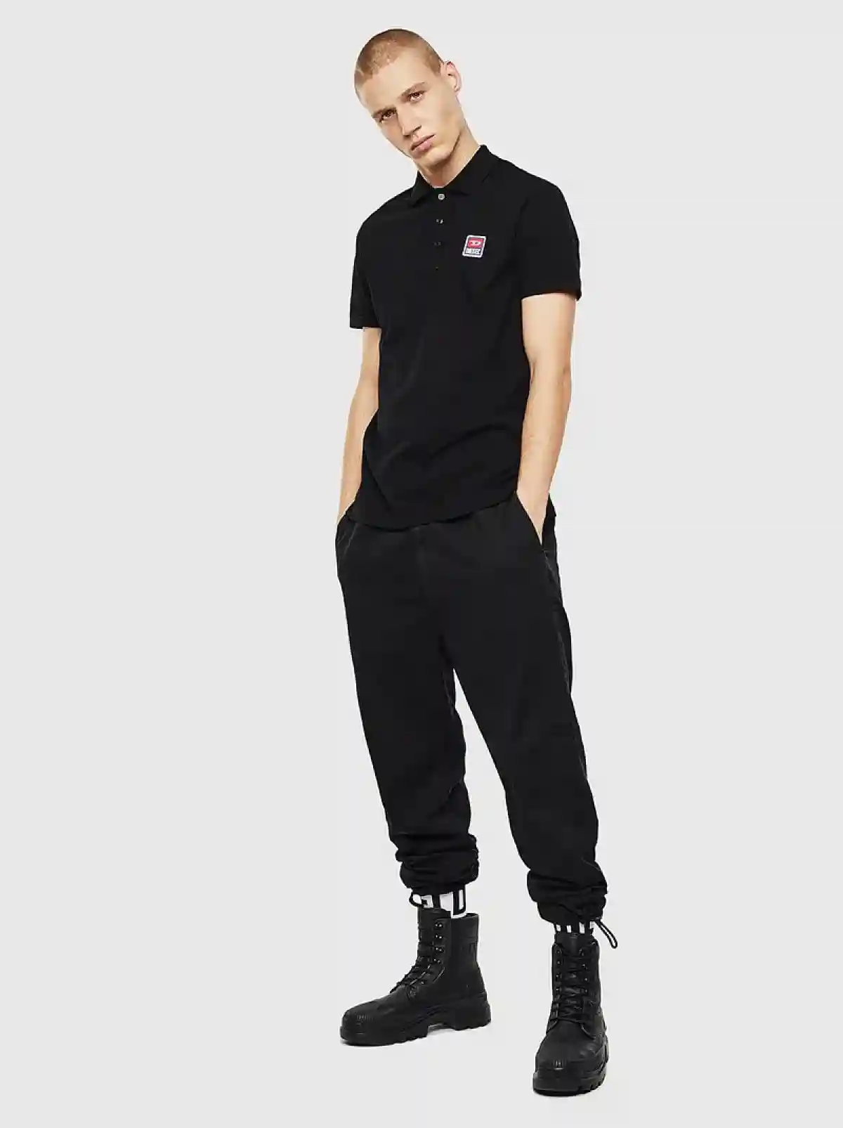 Black Polo shirt with jacquard logo patch