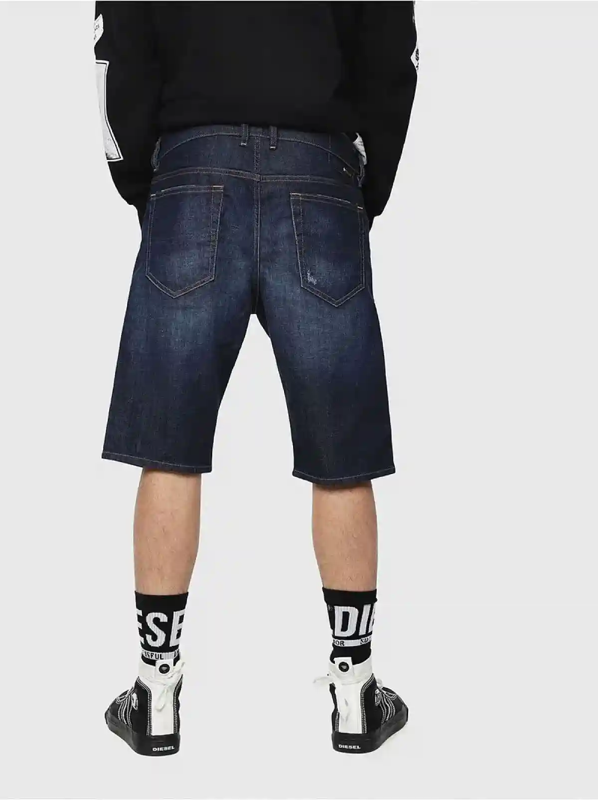 Blue Slim shorts in denim with abrasions