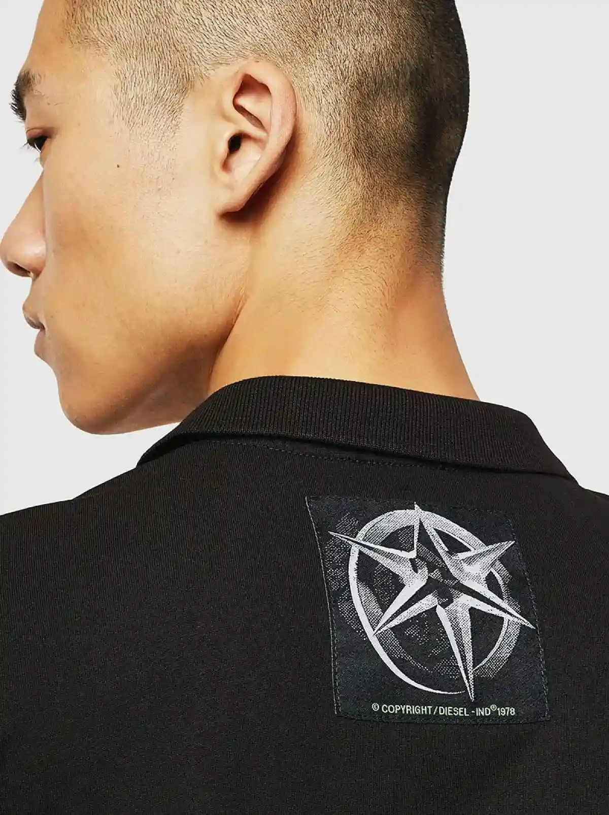Black Polo shirt with jacquard patches
