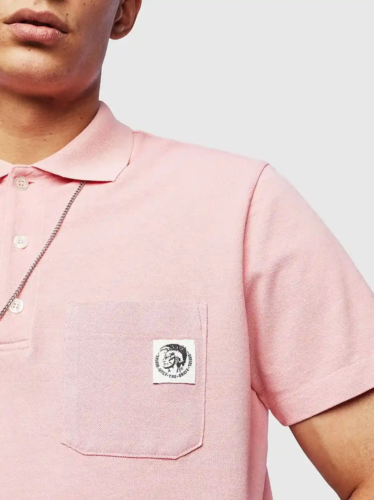 Pink Polo shirt with Mohawk patch
