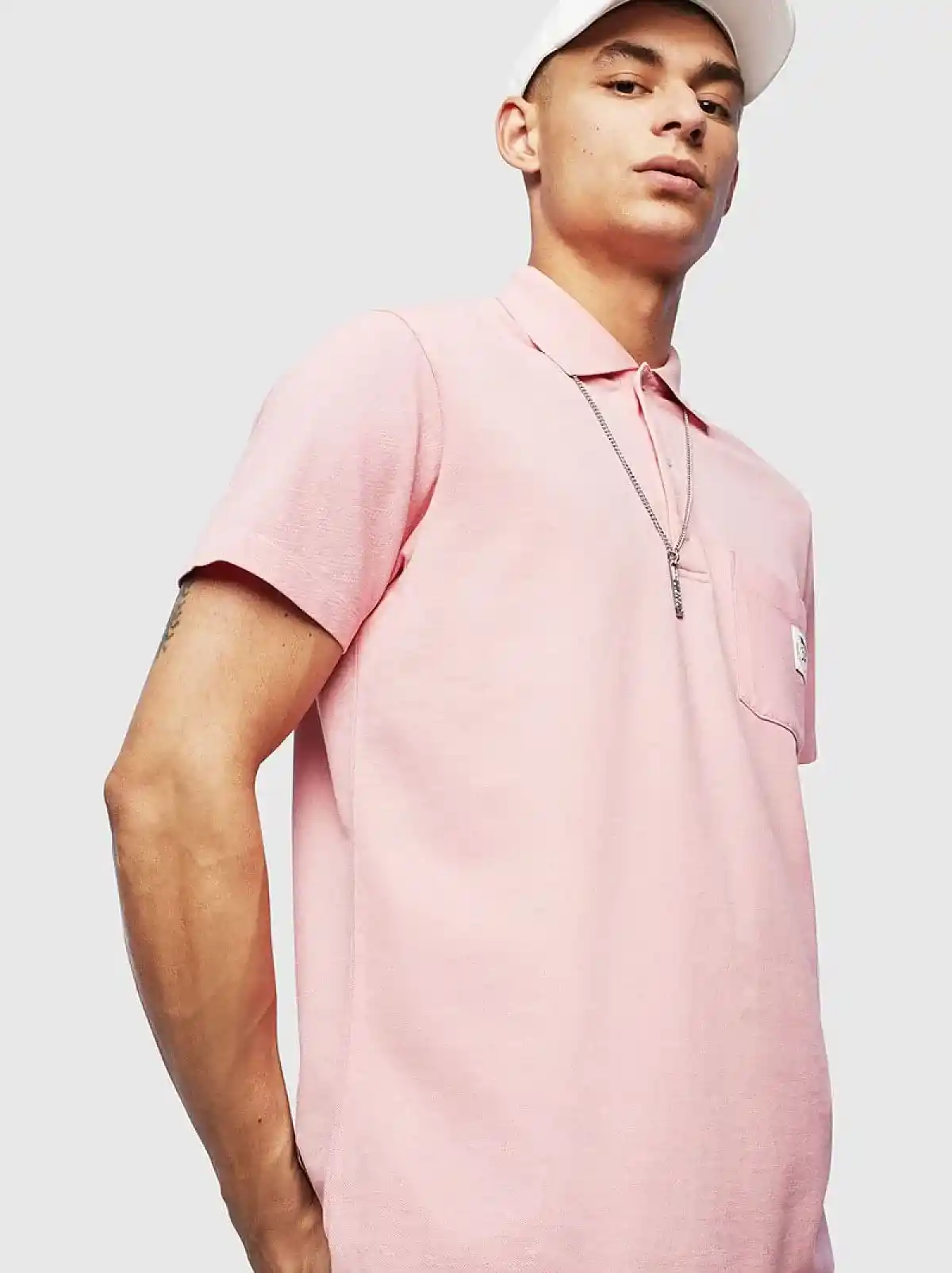 Pink Polo shirt with Mohawk patch