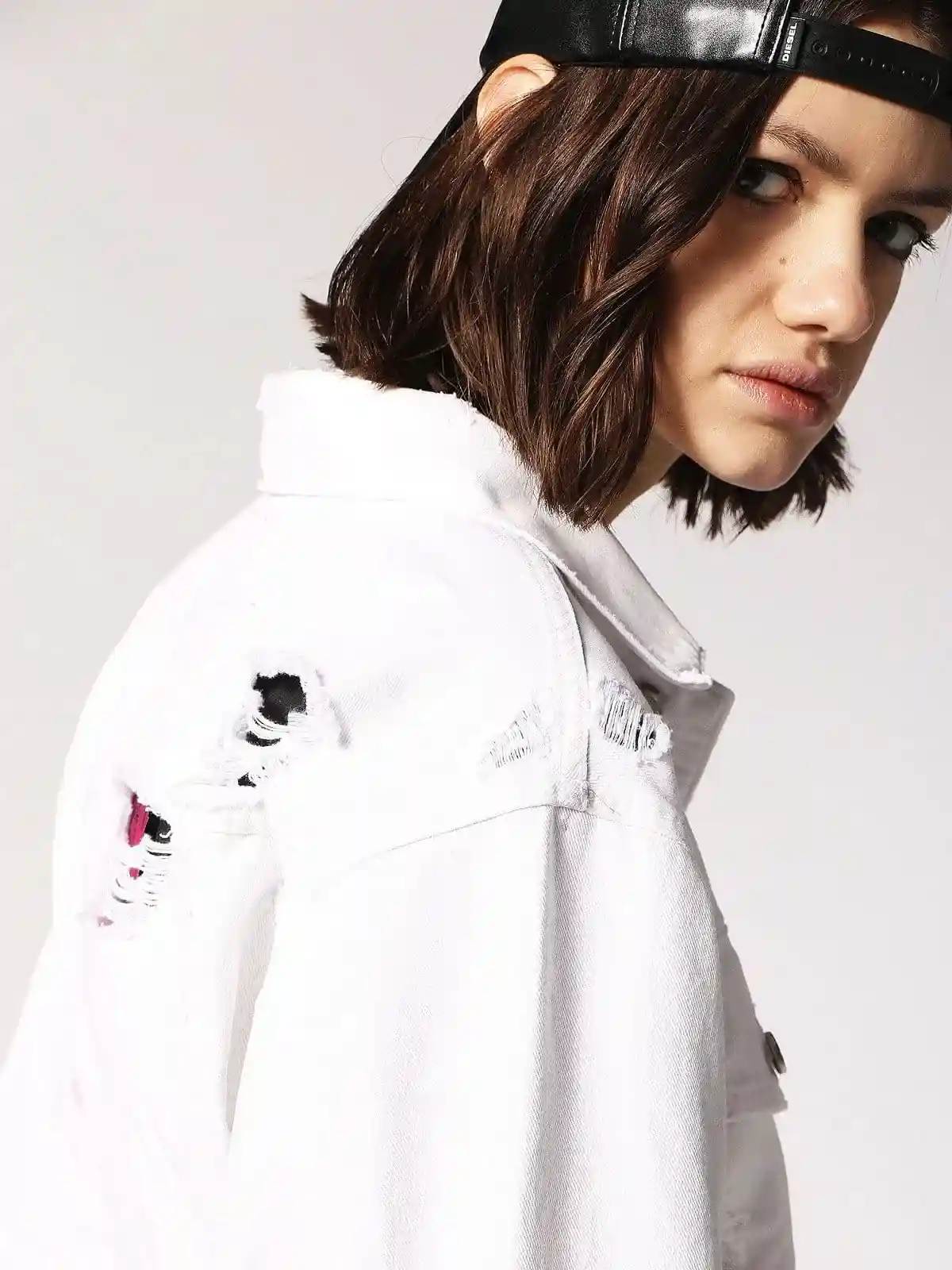 White Denim trucker with destroyed details