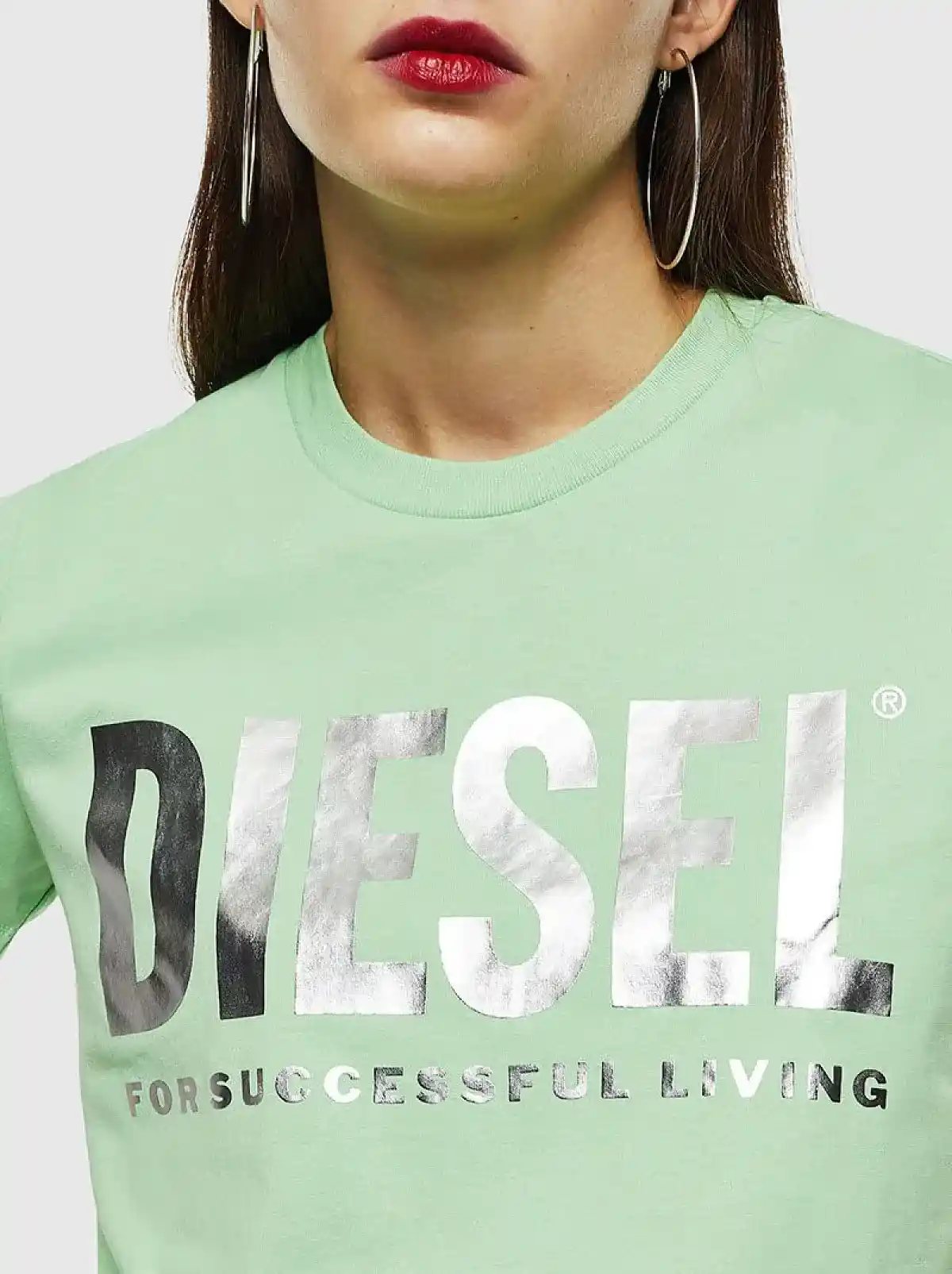 Green T-shirt with PVC lettering and slogan