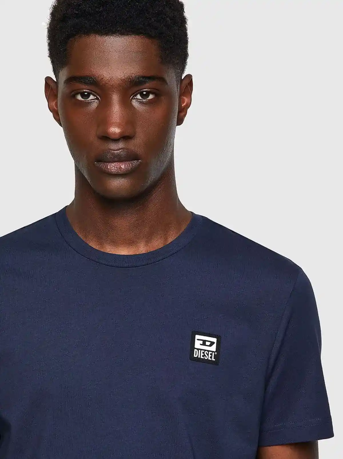 Blue T-shirt with D logo patch