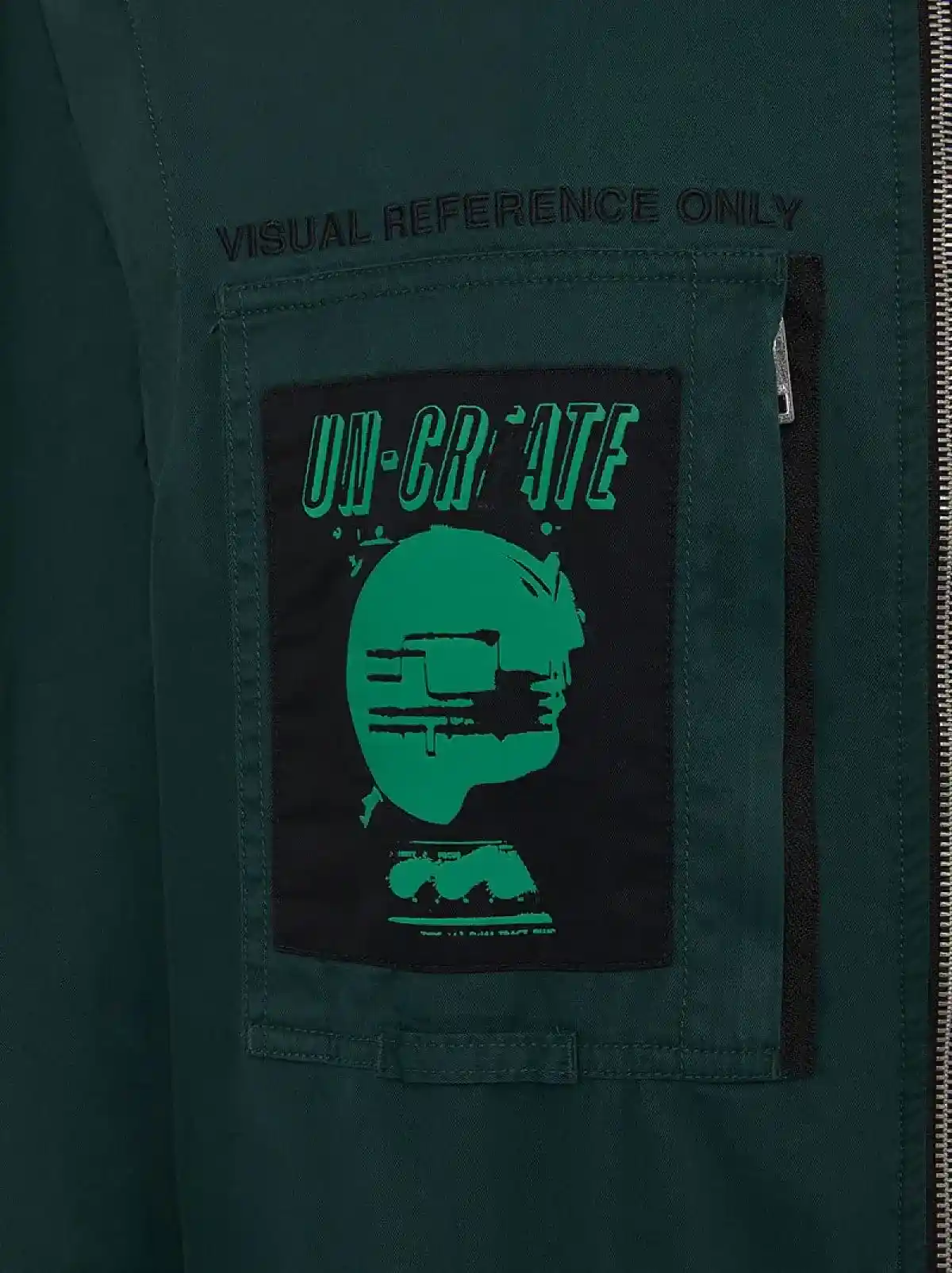 Green Convertible jumpsuit with patches