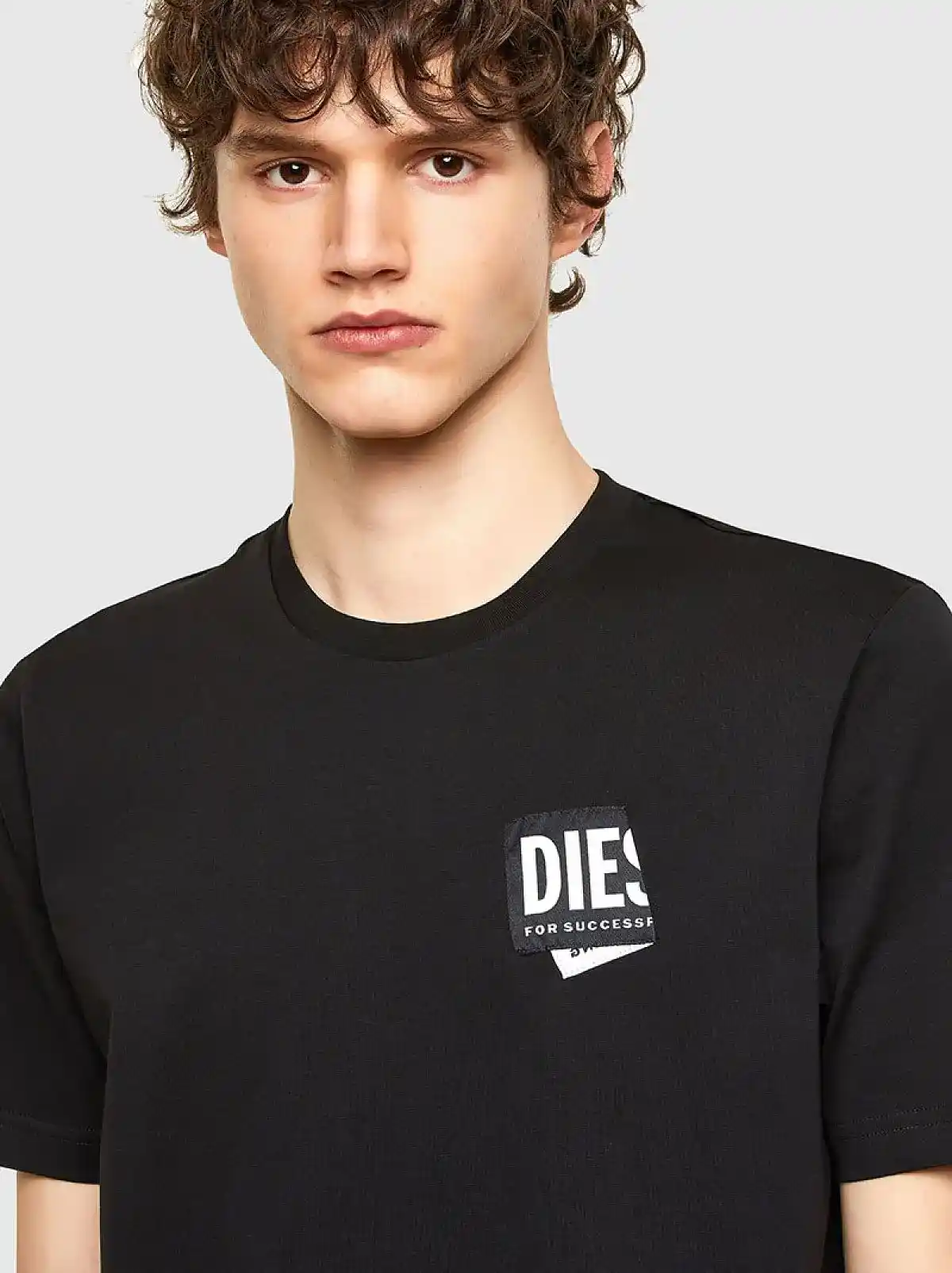 Black T-shirt with folded logo patch