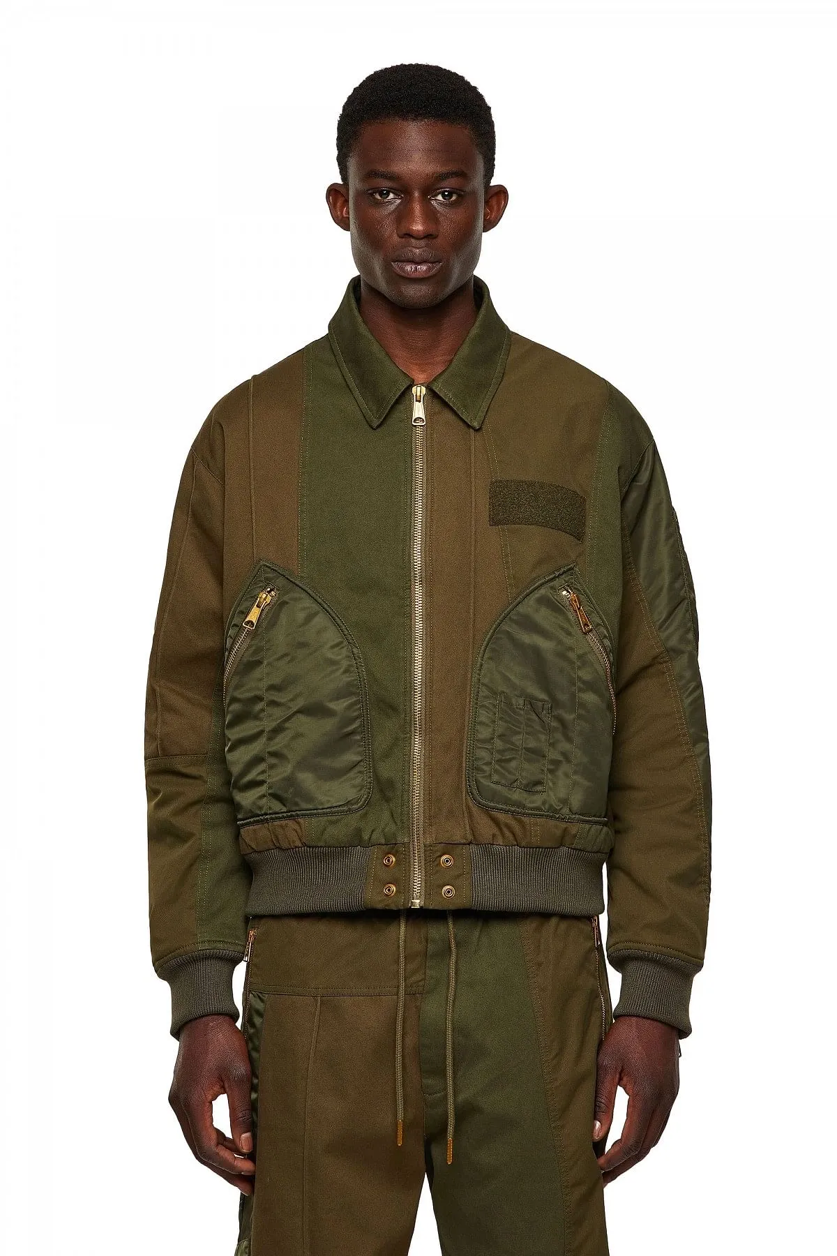 Green Bomber jacket with panelled design