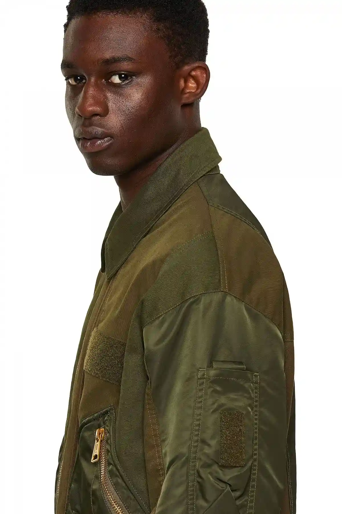 Green Bomber jacket with panelled design