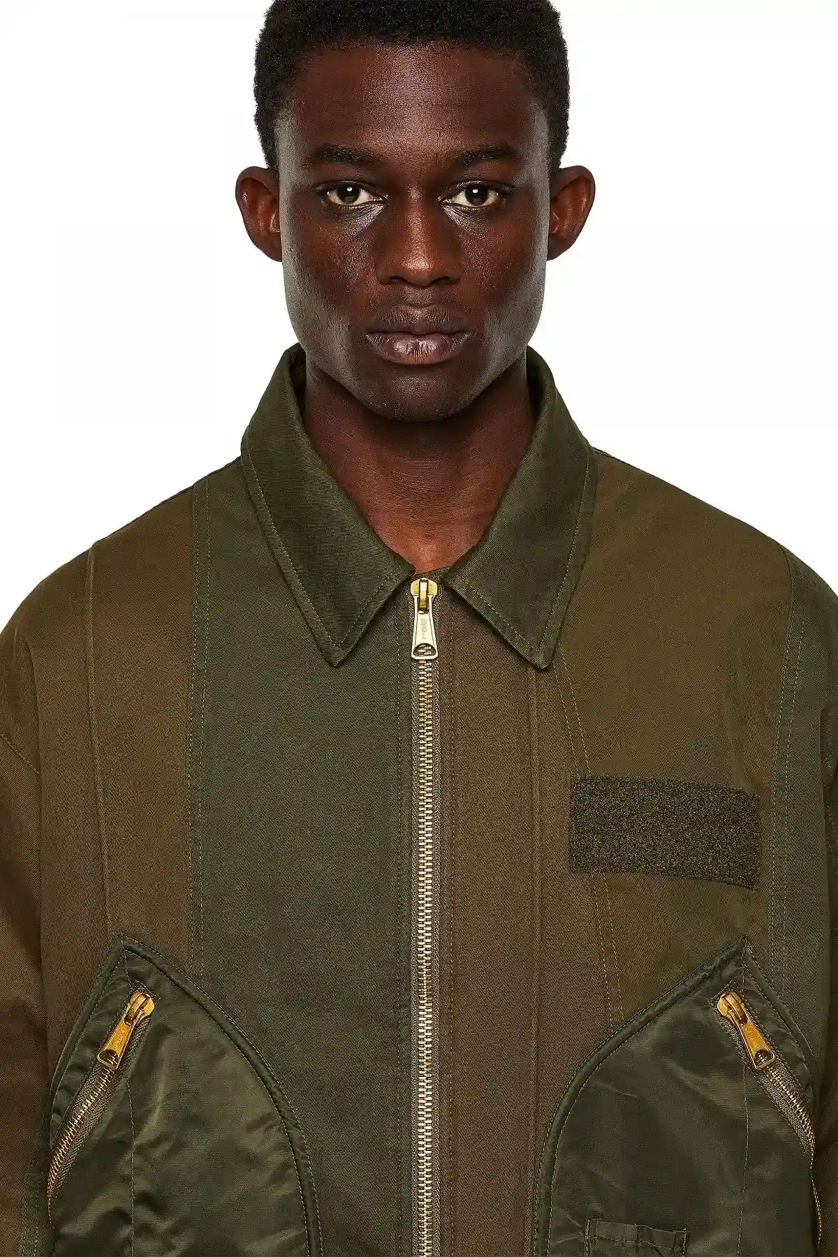 Green Bomber jacket with panelled design