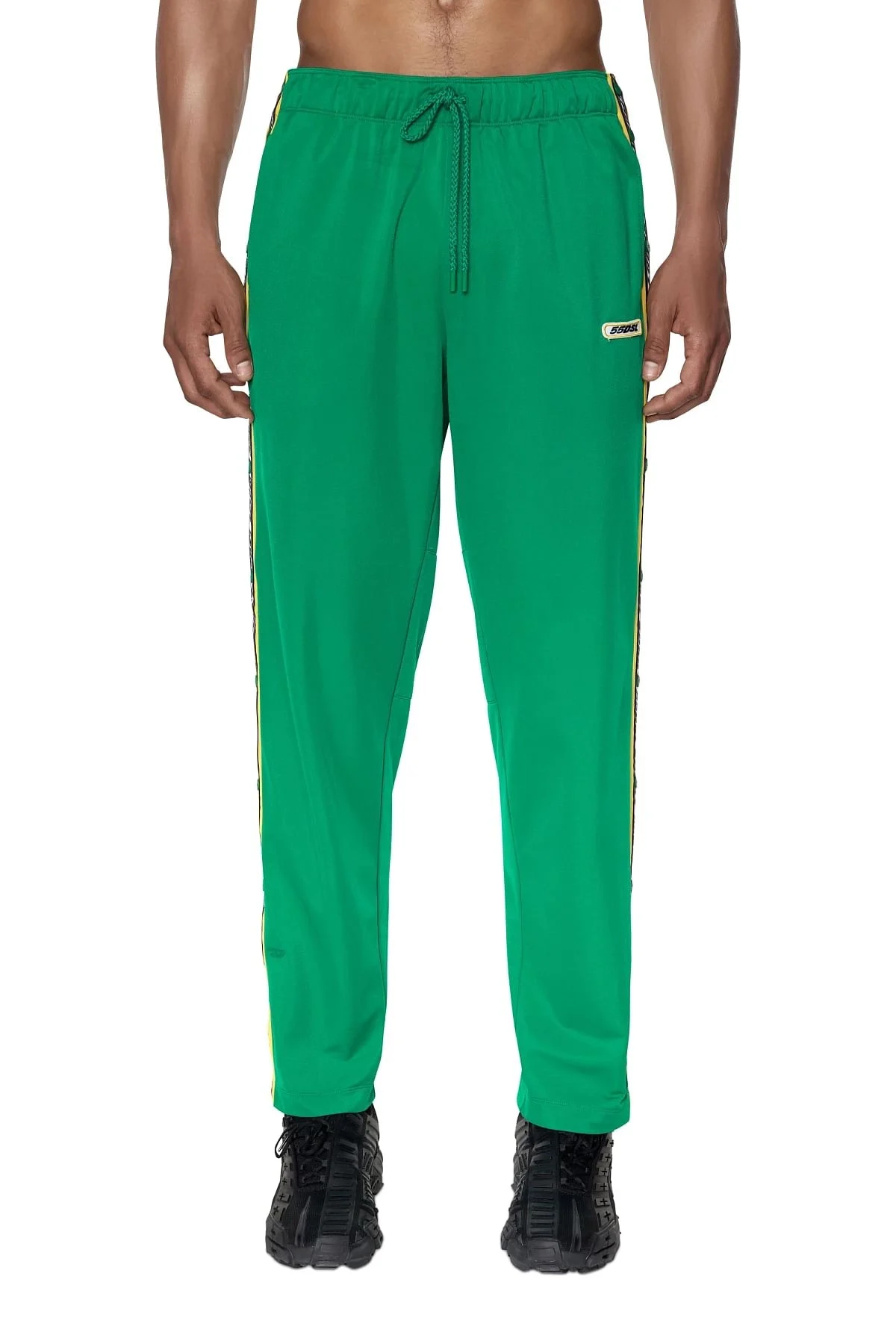 Green Tear-away track pants