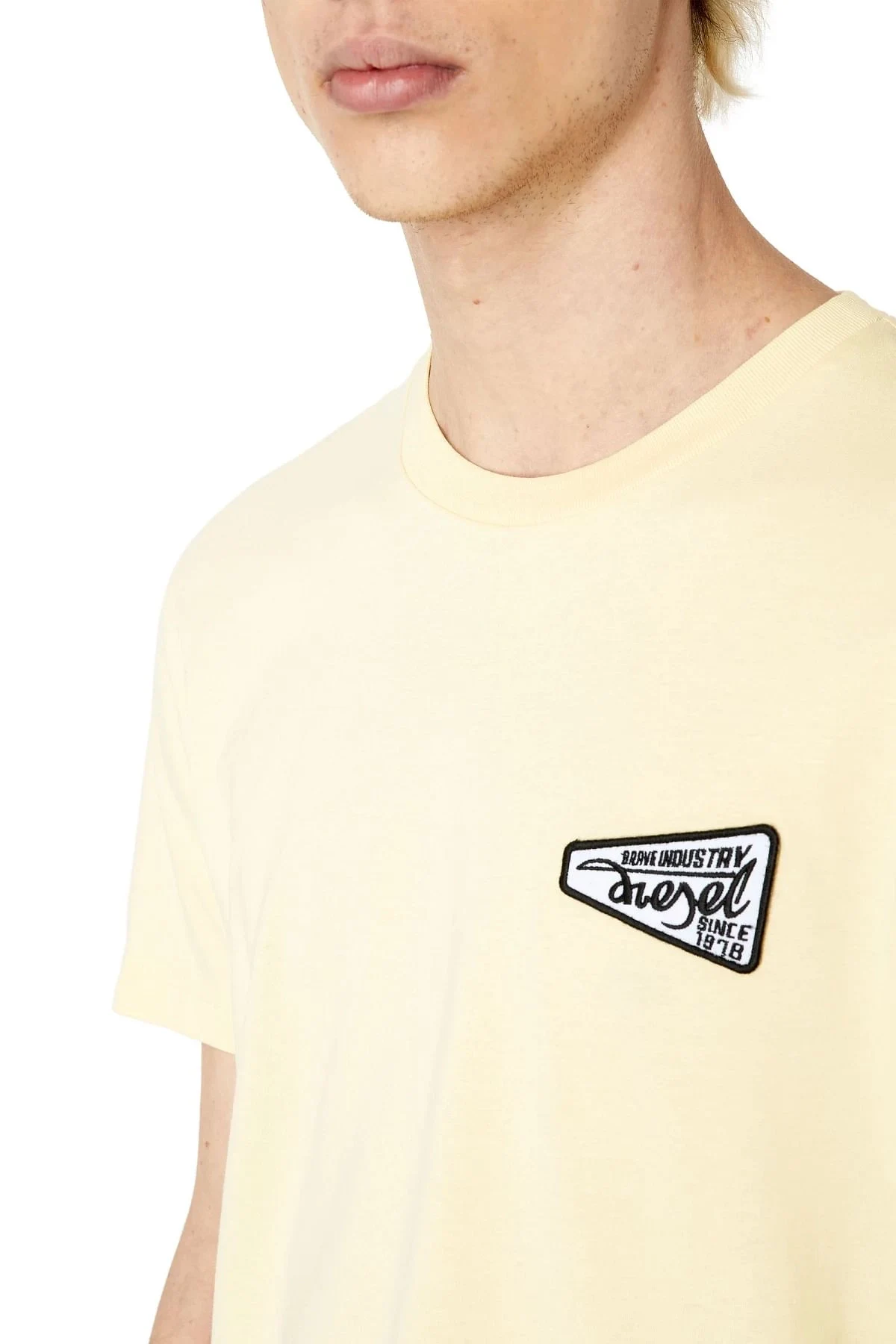Yellow T-shirt with Brave Industry logo patch