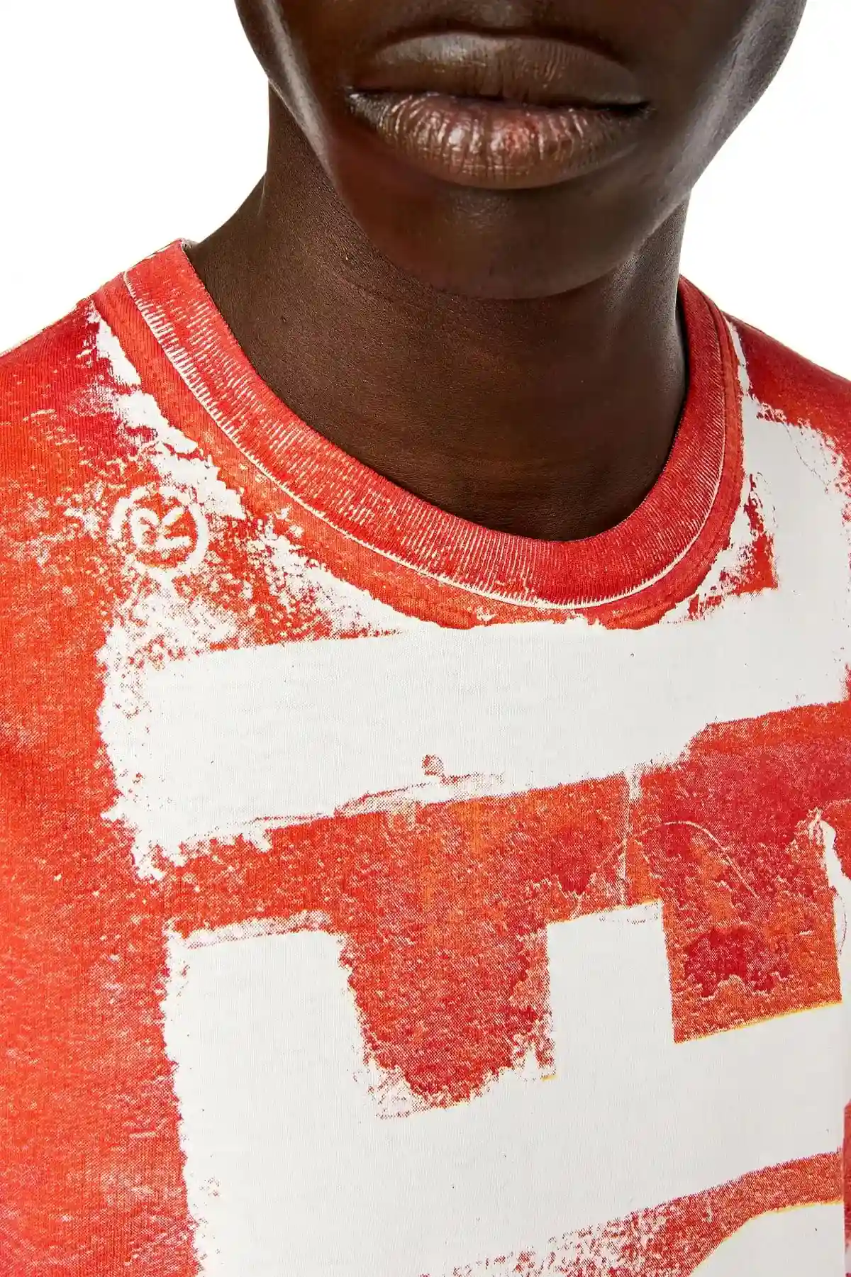 Red T-shirt with bleeding logo