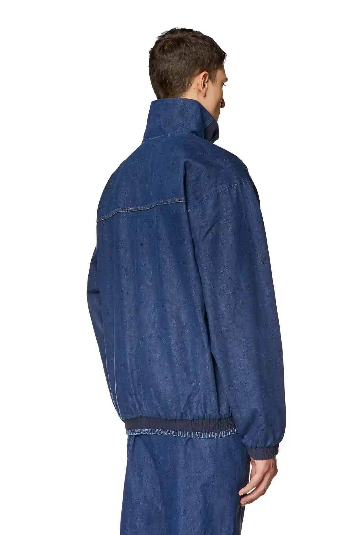 Blue Track jacket in wrinkled nylon and denim