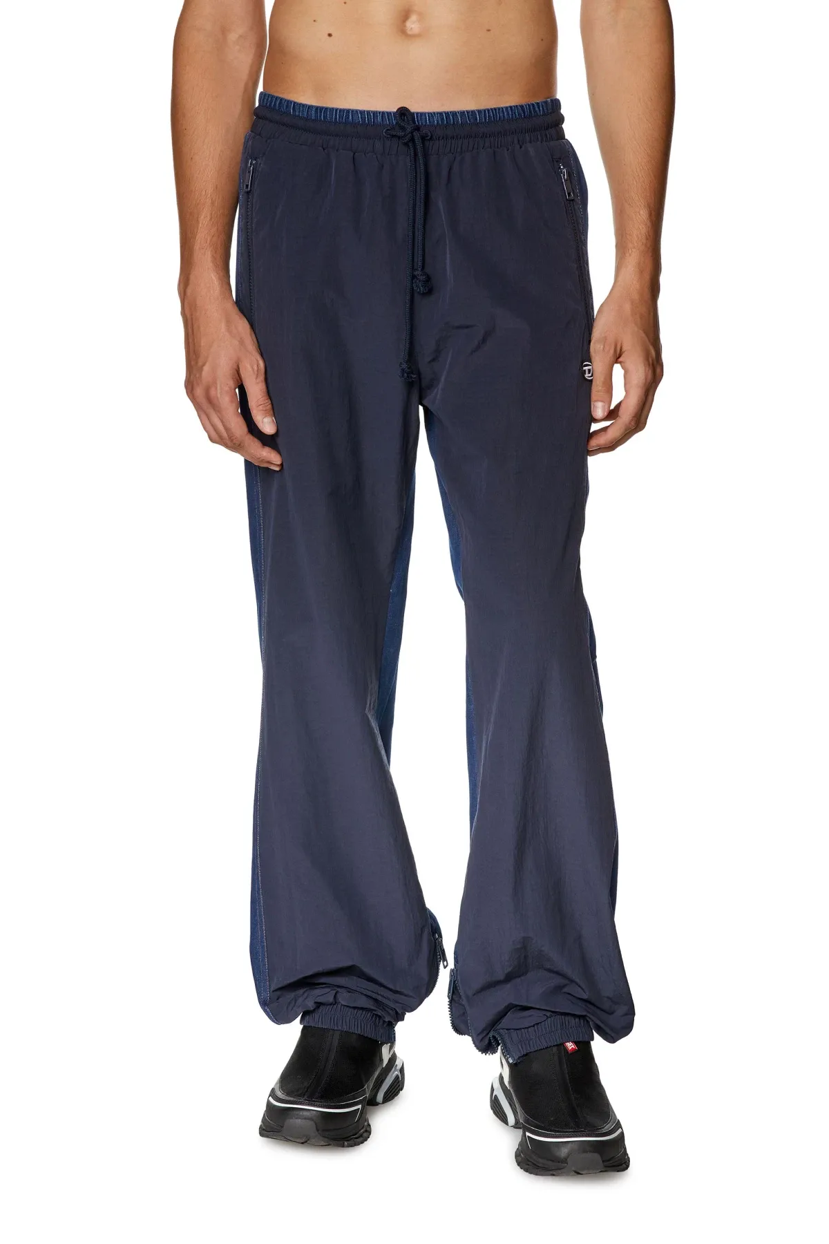 Blue Track pants in wrinkled nylon and denim