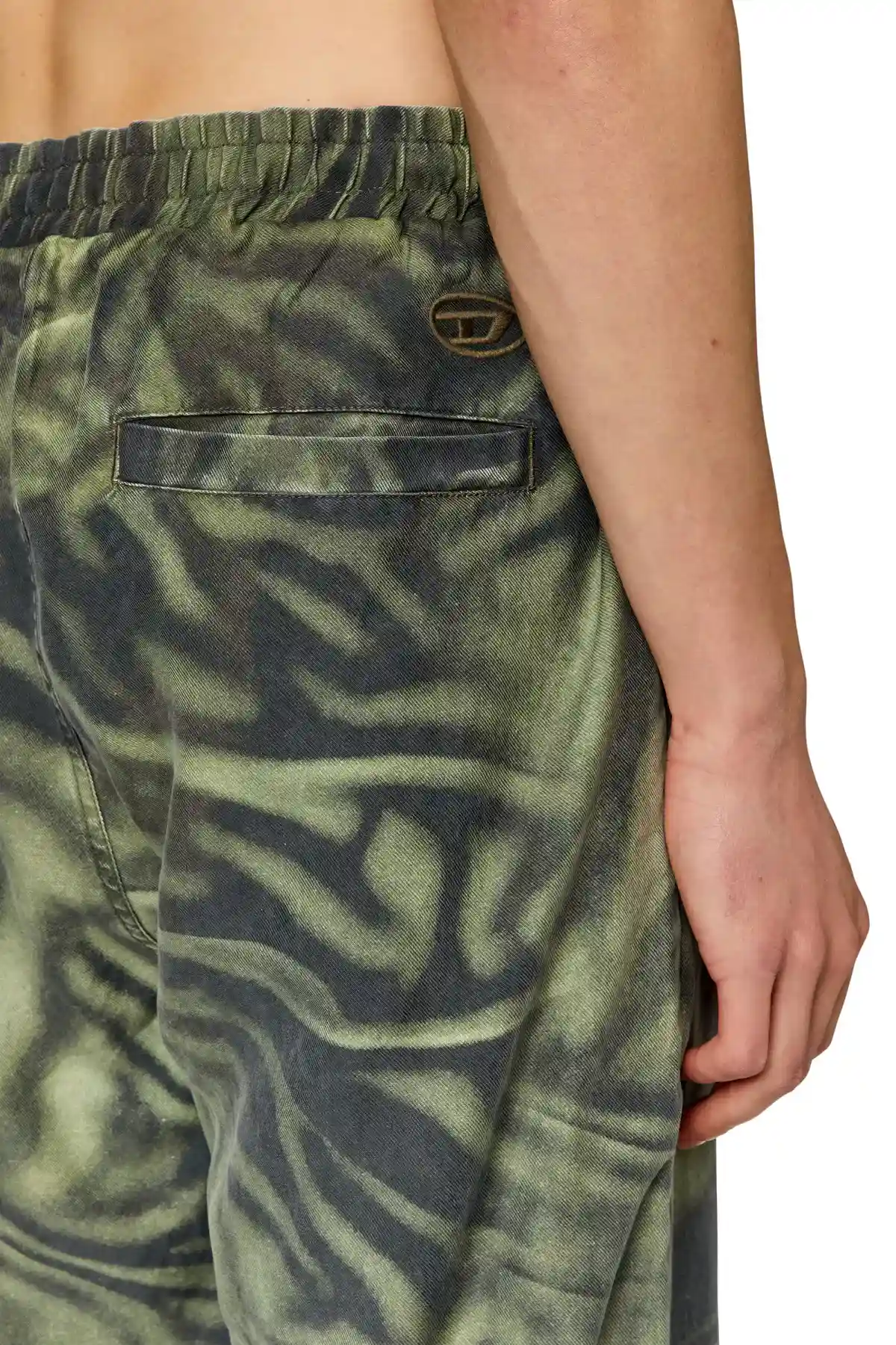 Green Twill pants with zebra-camo print