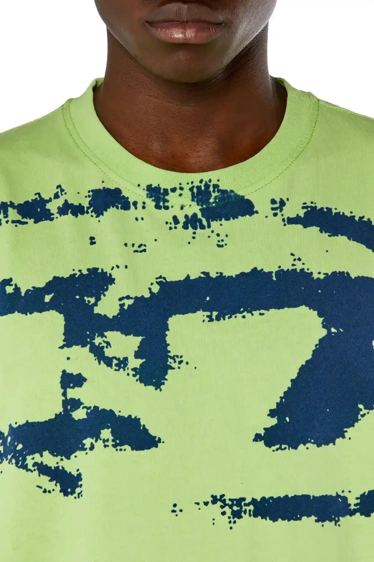 green T-shirt with distressed flocked logo