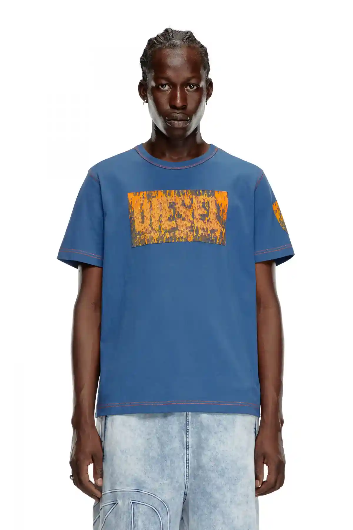 blue T-shirt with graphic patches