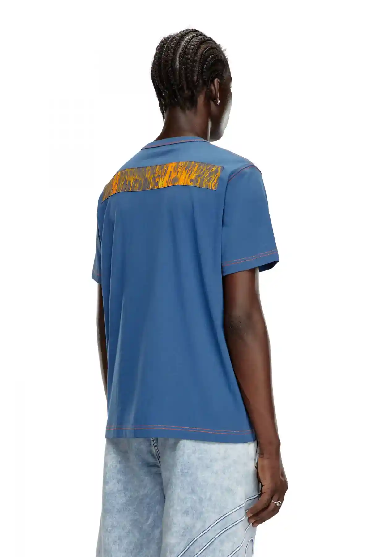 blue T-shirt with graphic patches