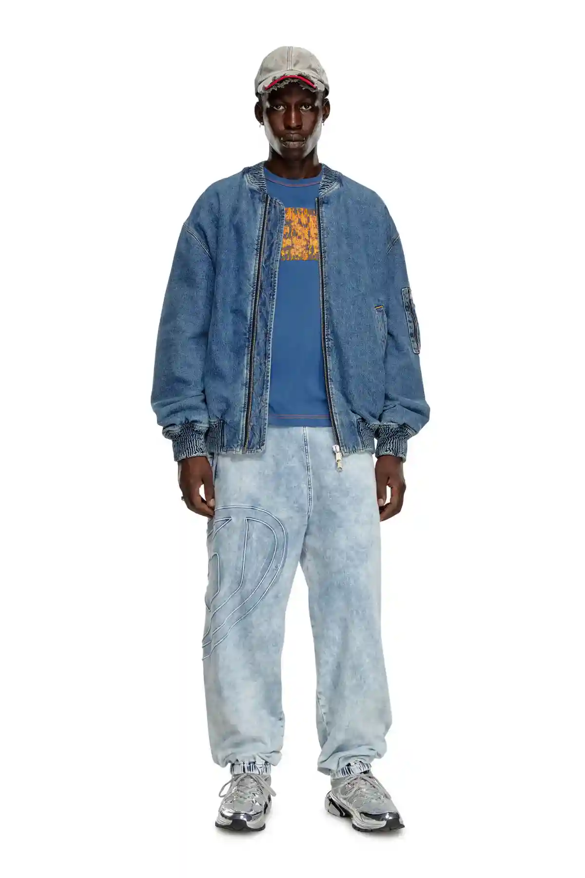 blue T-shirt with graphic patches