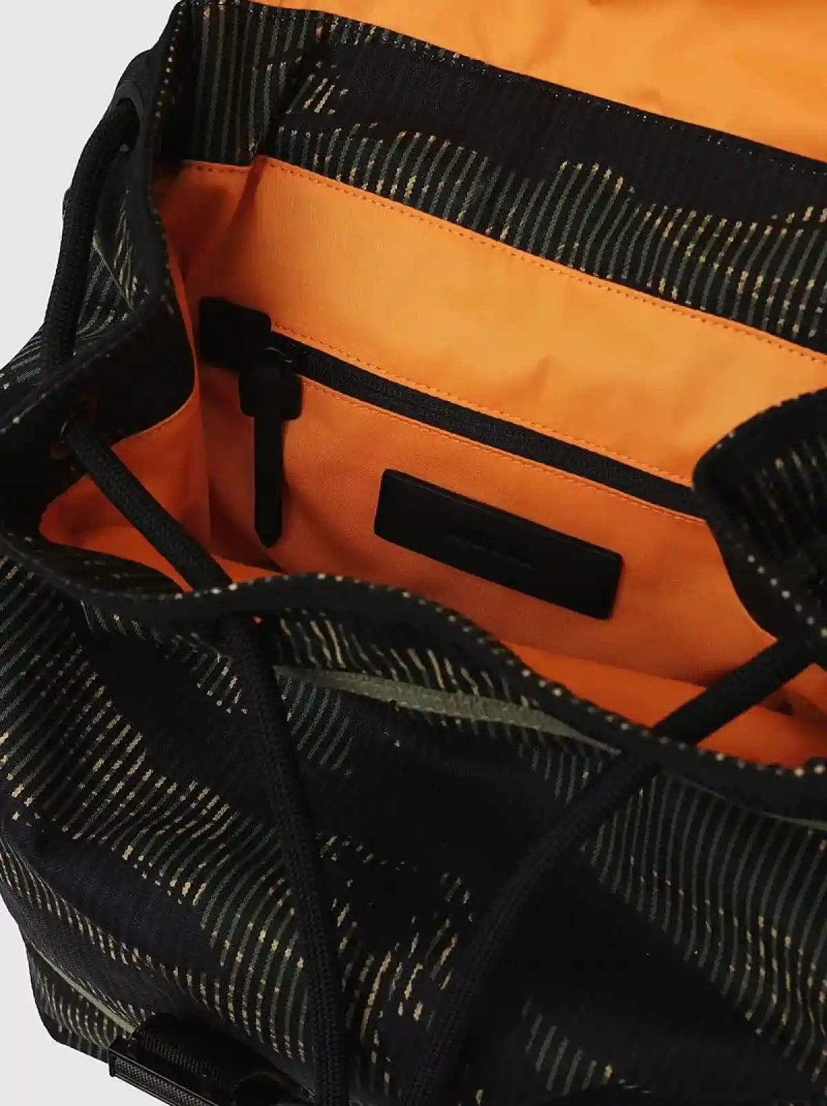Green Buckled backpack in striped camo denim