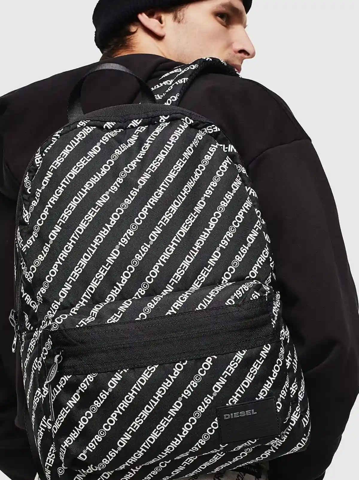 Black Backpack with all-over Copyright logo