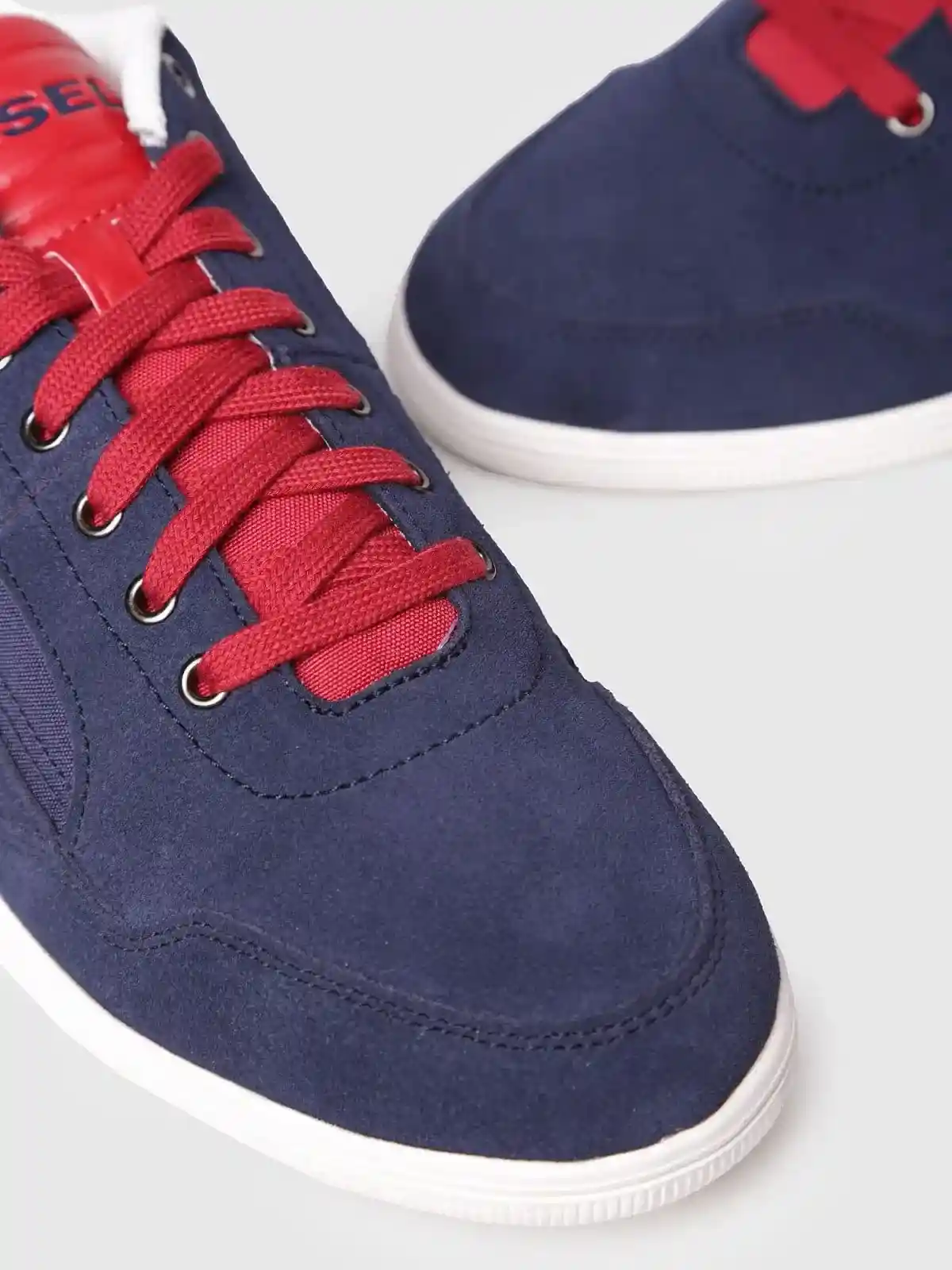 Blue Sneakers in suede with a fabric panel
