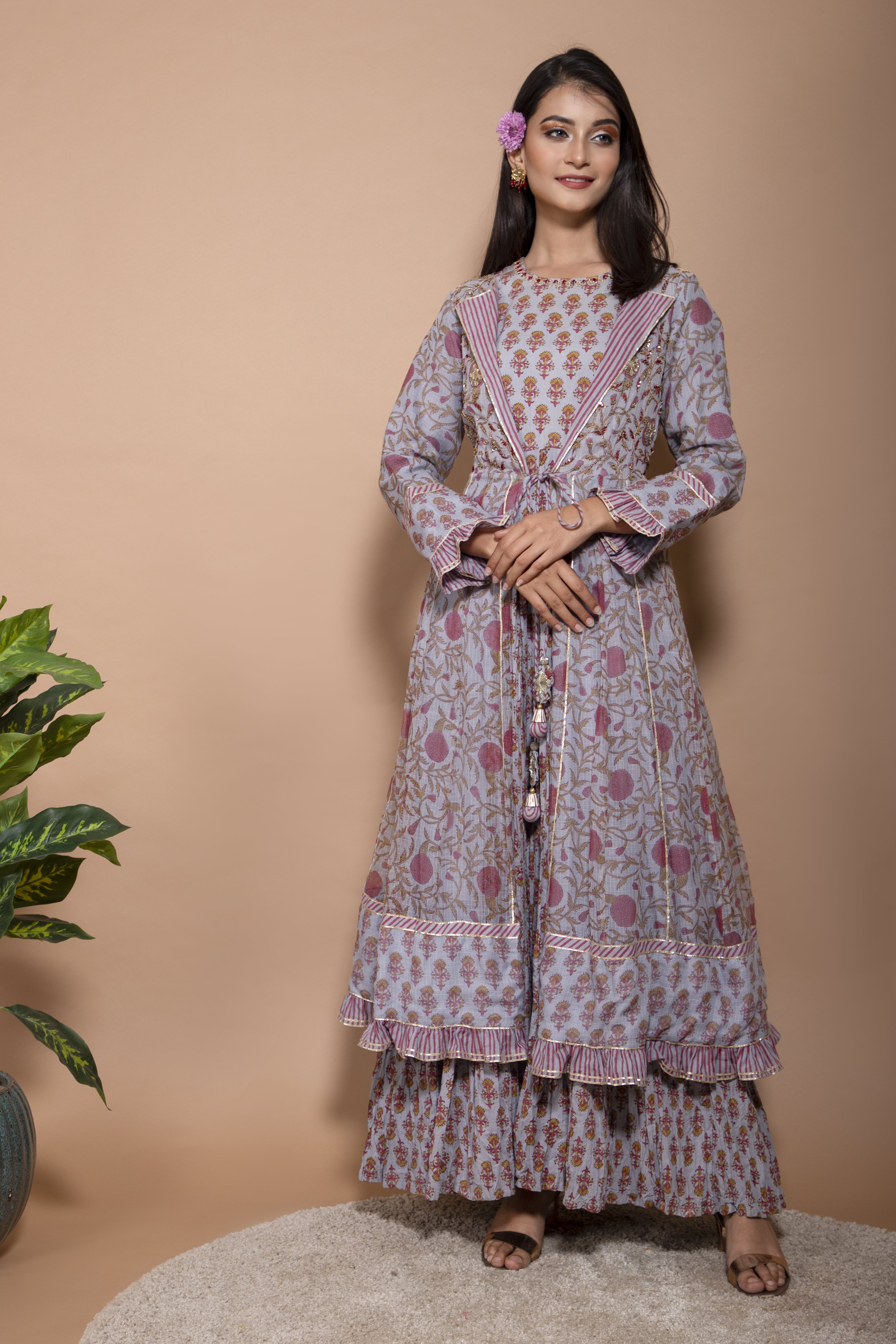 KAARAH BY KAAVYA | Kota doriya jacket with striped collar and patch work on the sleeves and bottom of the jacket and tassels in the front undefined