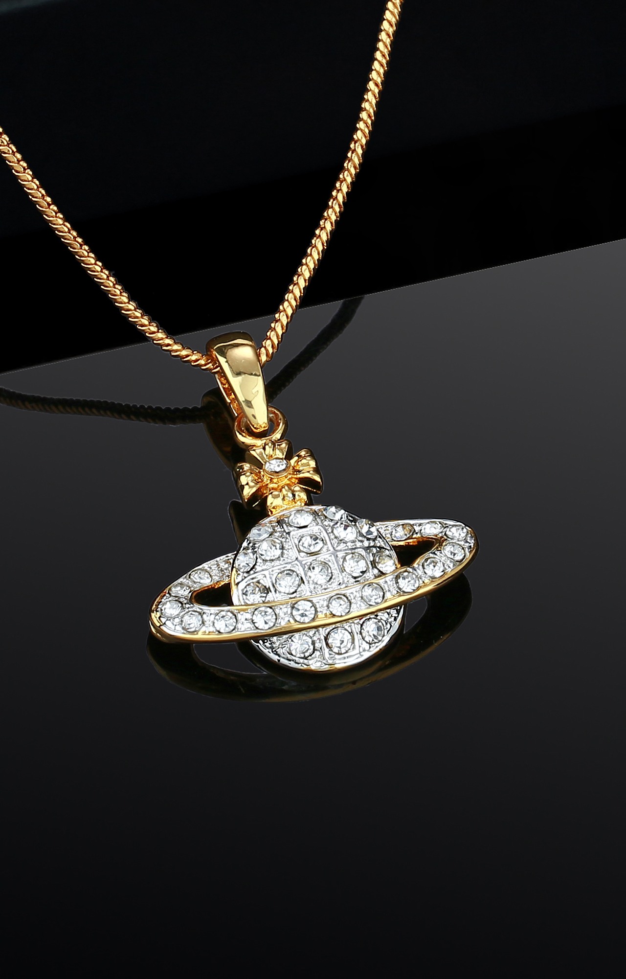 Estele Gold Plated Planet with a Ring Designer Pendant Studded with Crystals for Women