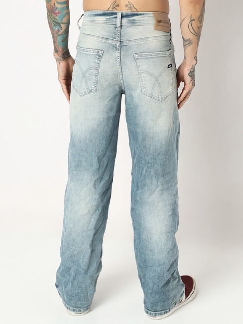 Jagger In Mid-Wash Distressed Straight Fit Jeans