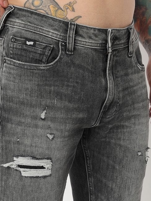Lightly Washed Slim Fit Distressed Jeans