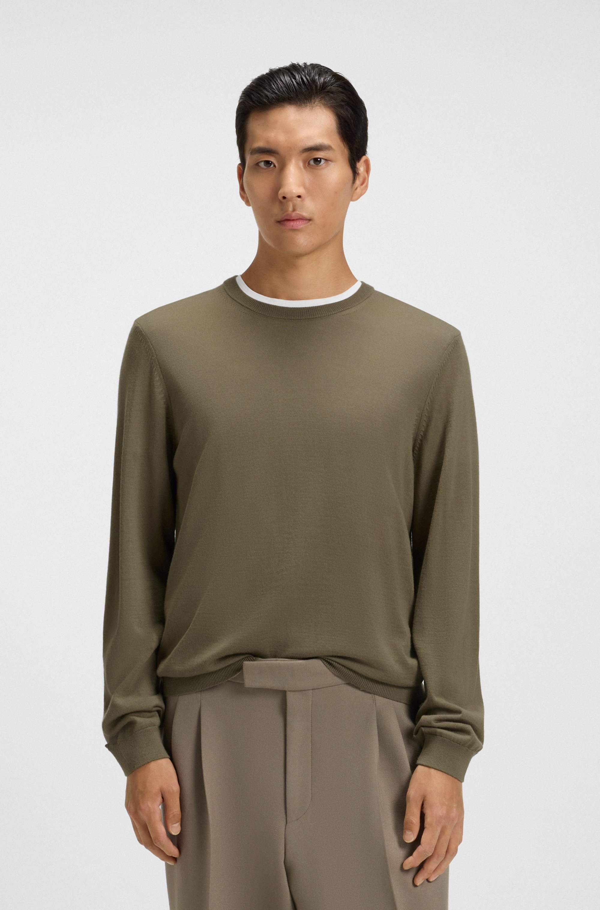 Slim-fit sweater in merino wool with crew neckline
