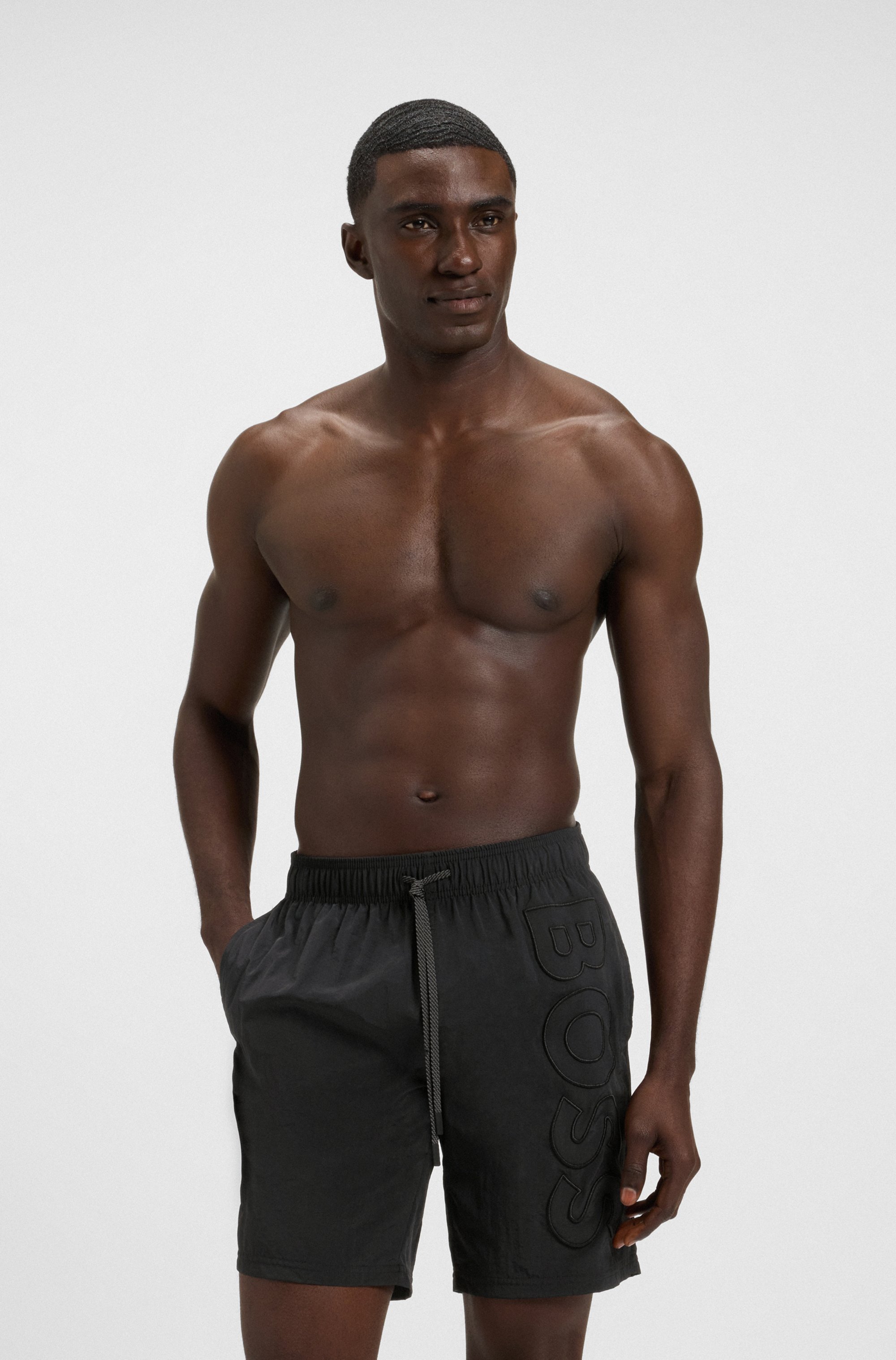 Quick-dry swim shorts with large embroidered logo