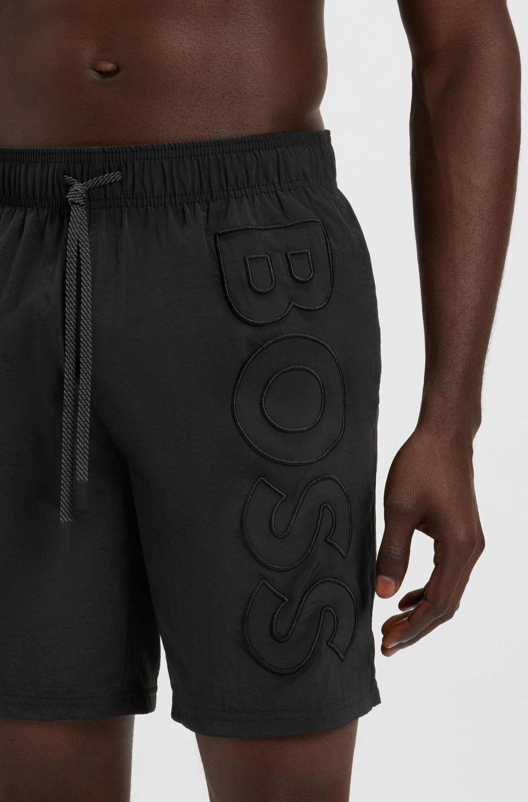 Swim shorts with 3D logo embroidery