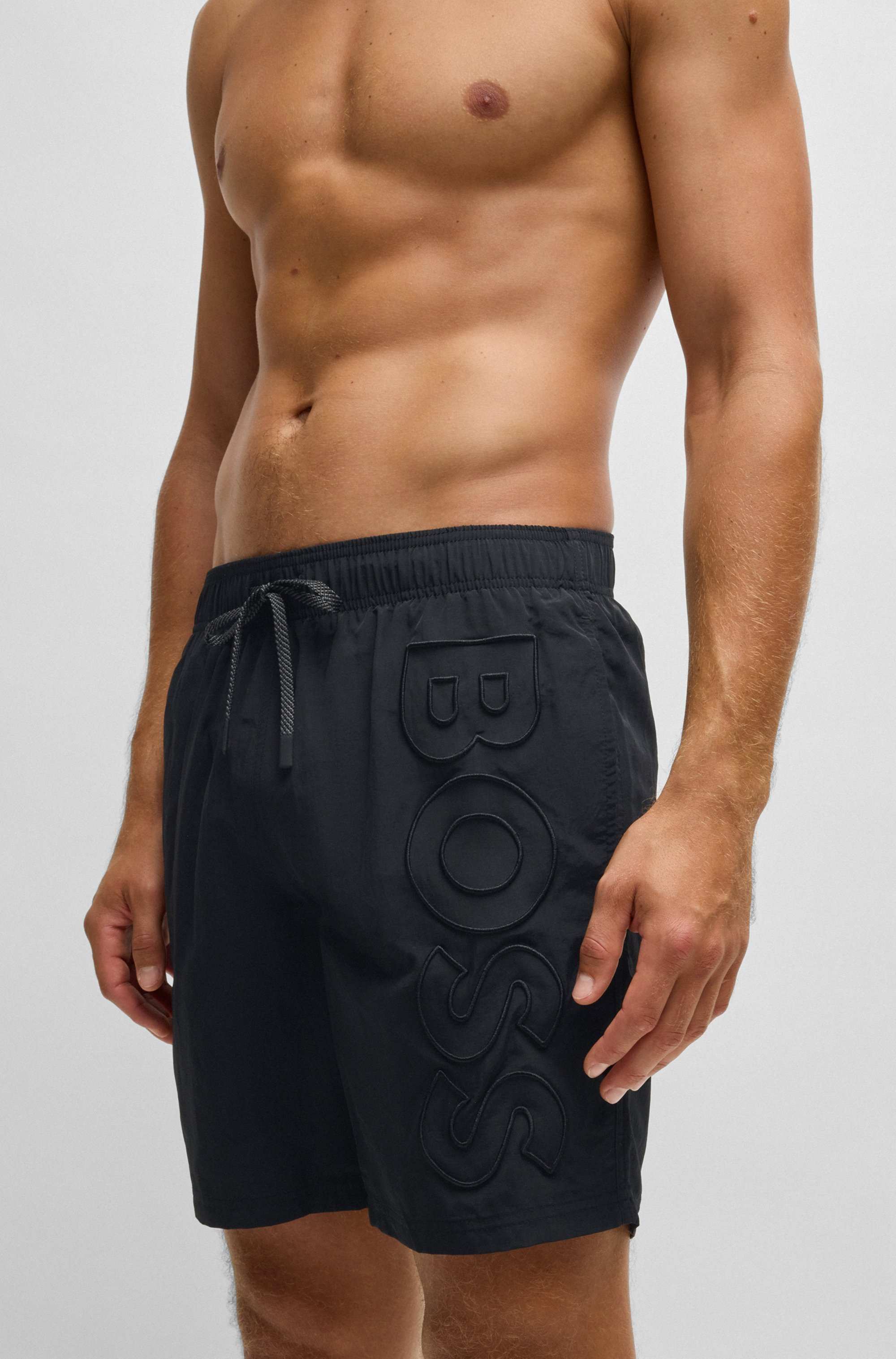 Swim shorts with 3D embroidered logo