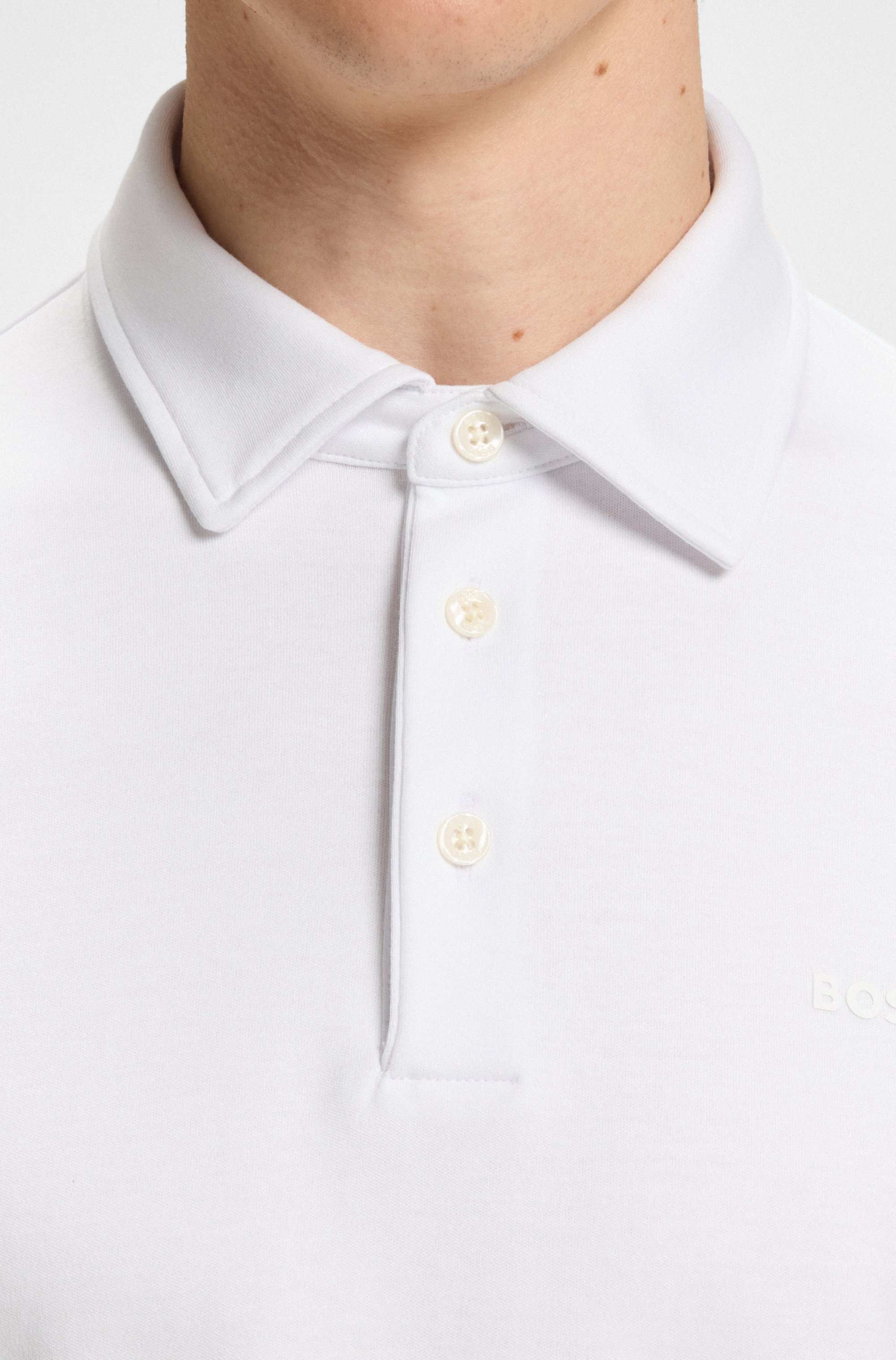 Slim-fit polo shirt in cotton with rubberised logo