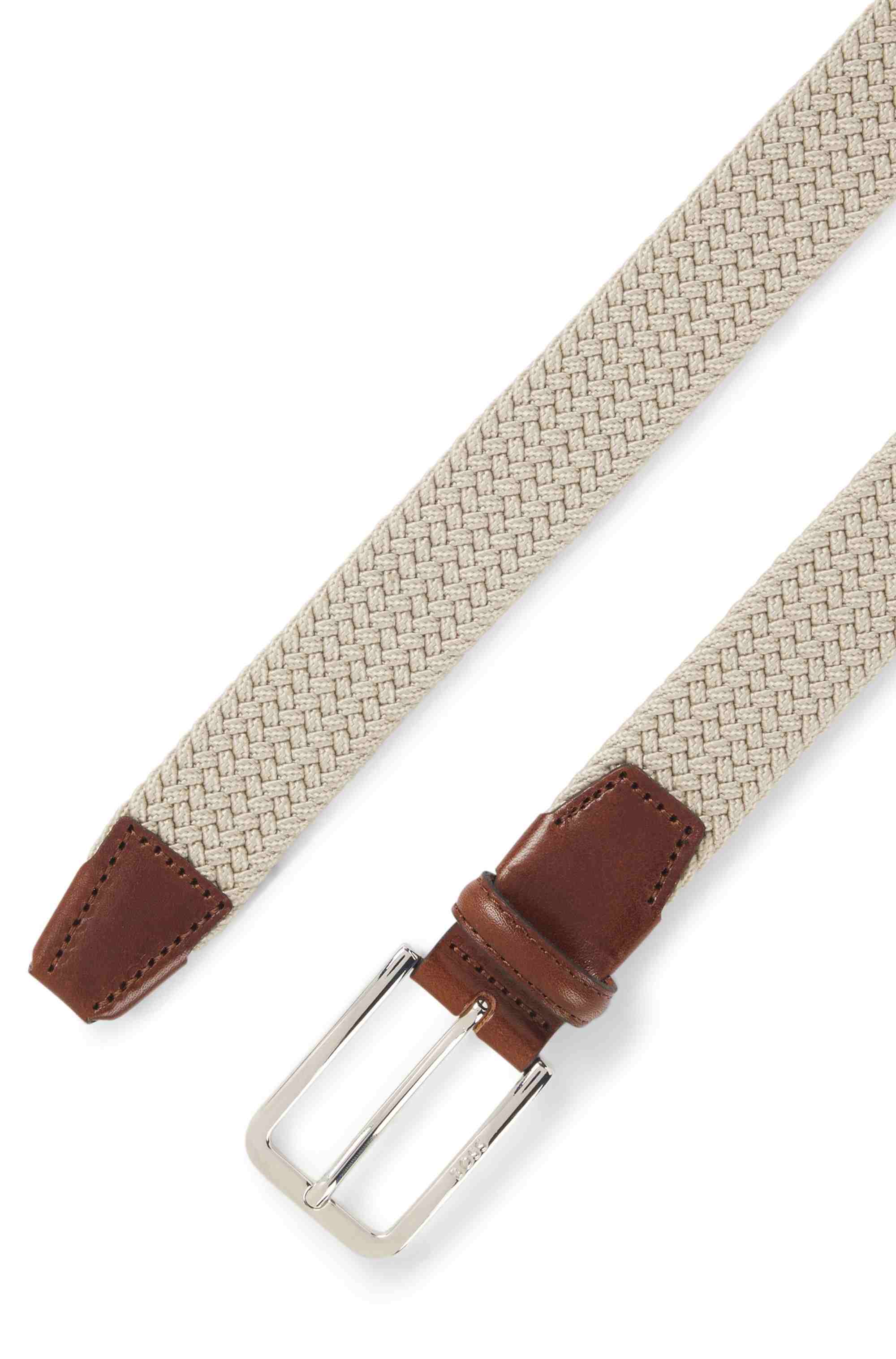 Woven belt with leather facings