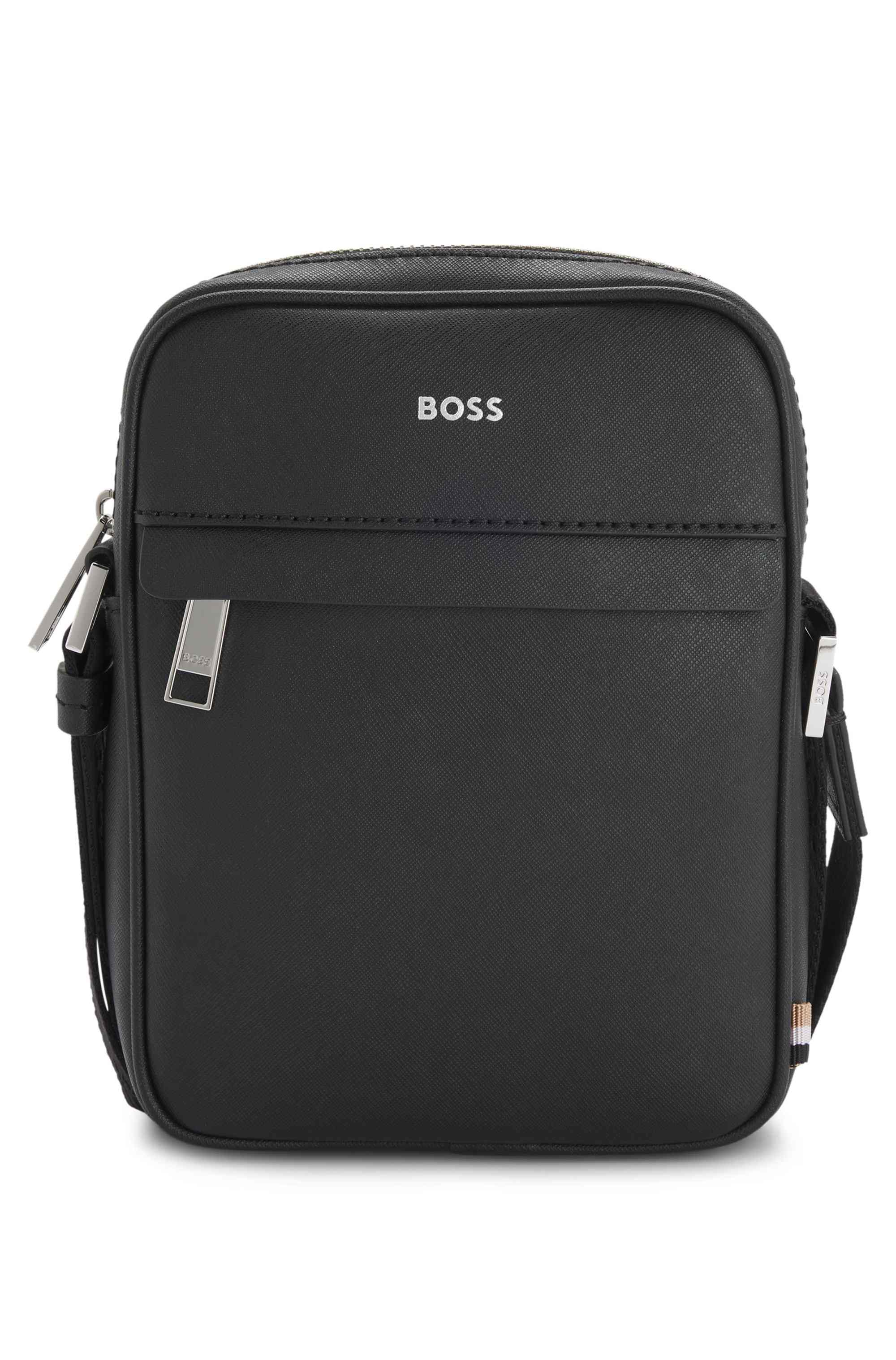 Reporter bag with signature stripe and logo detail