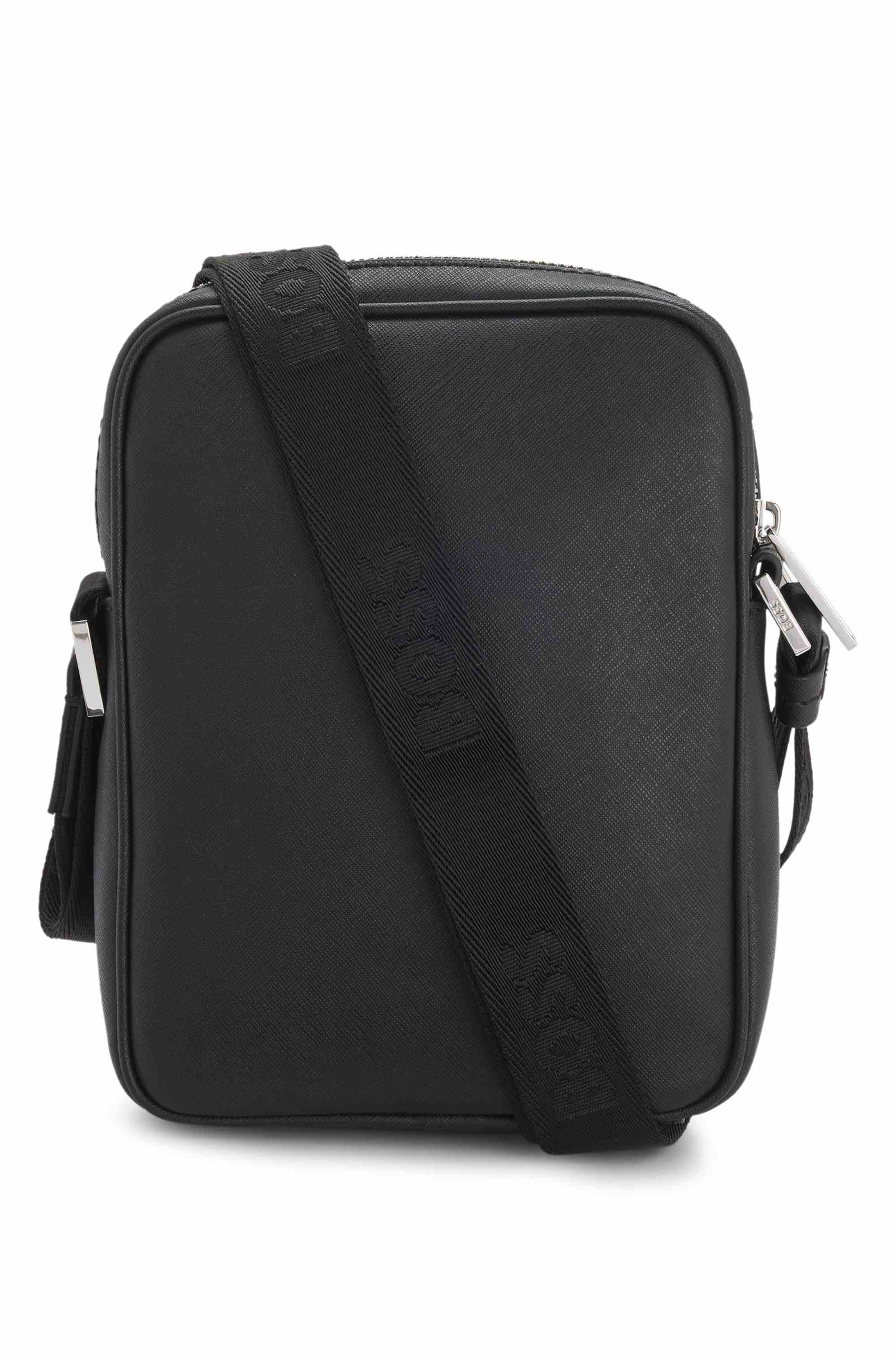 Reporter bag with signature stripe and logo detail